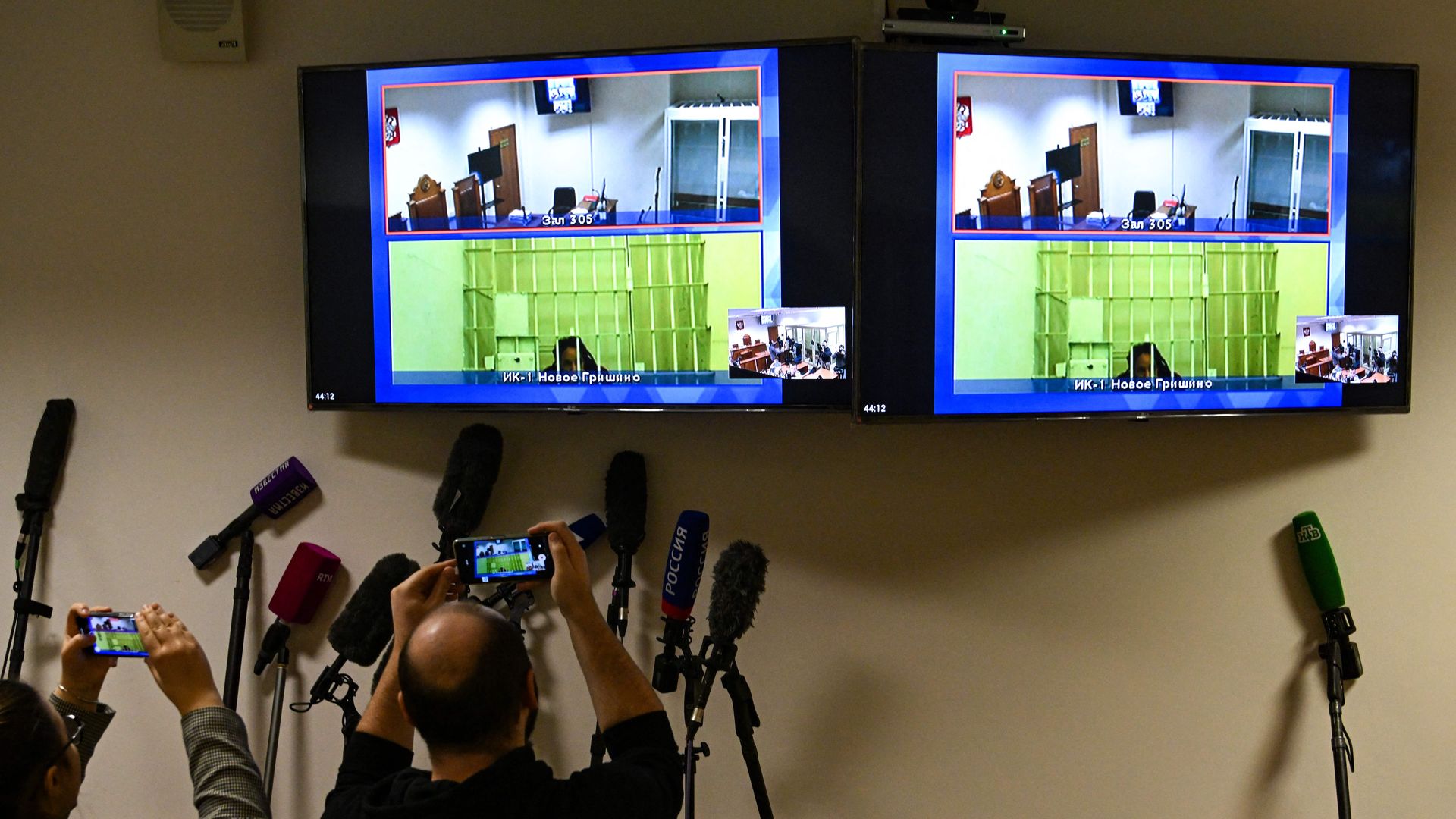 Brittney Griner seen on a screen during hearing