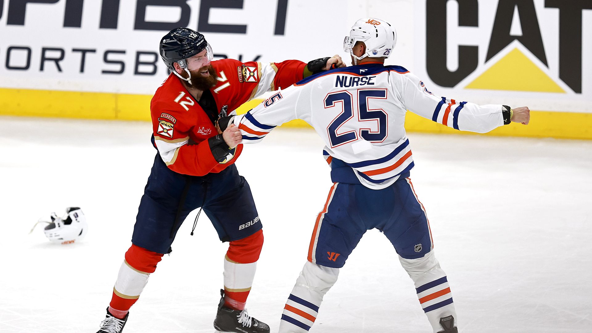 Panthers left wing Jonah Gadjovich smiles as he fights Darnell Nurse of the Oilers in Game 3. Photo: Carmen Mandato/Getty Images