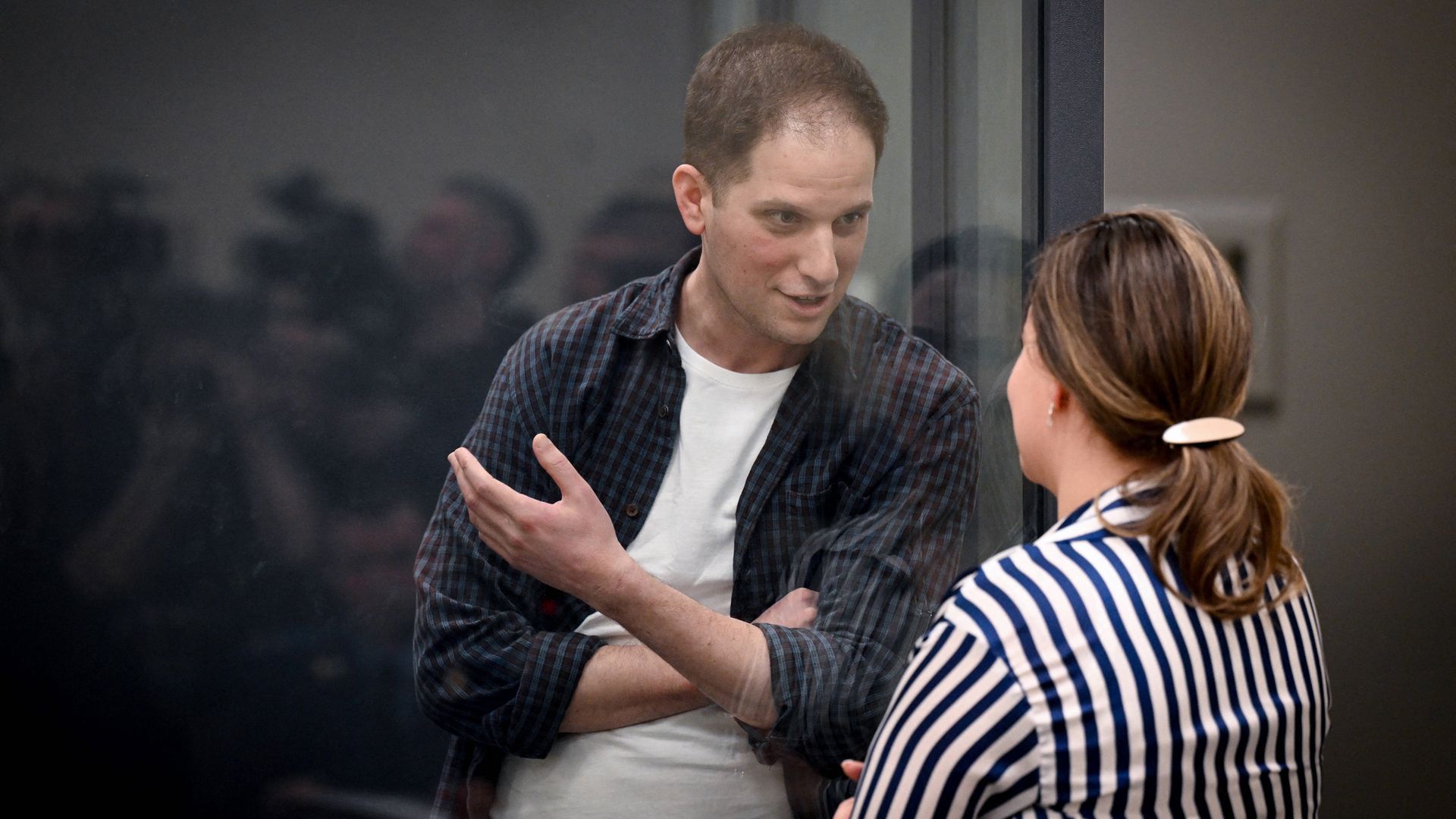 Wall Street Journal reporter Evan Gershkovich inside a defendants' cage in a Moscow court in April 2024.