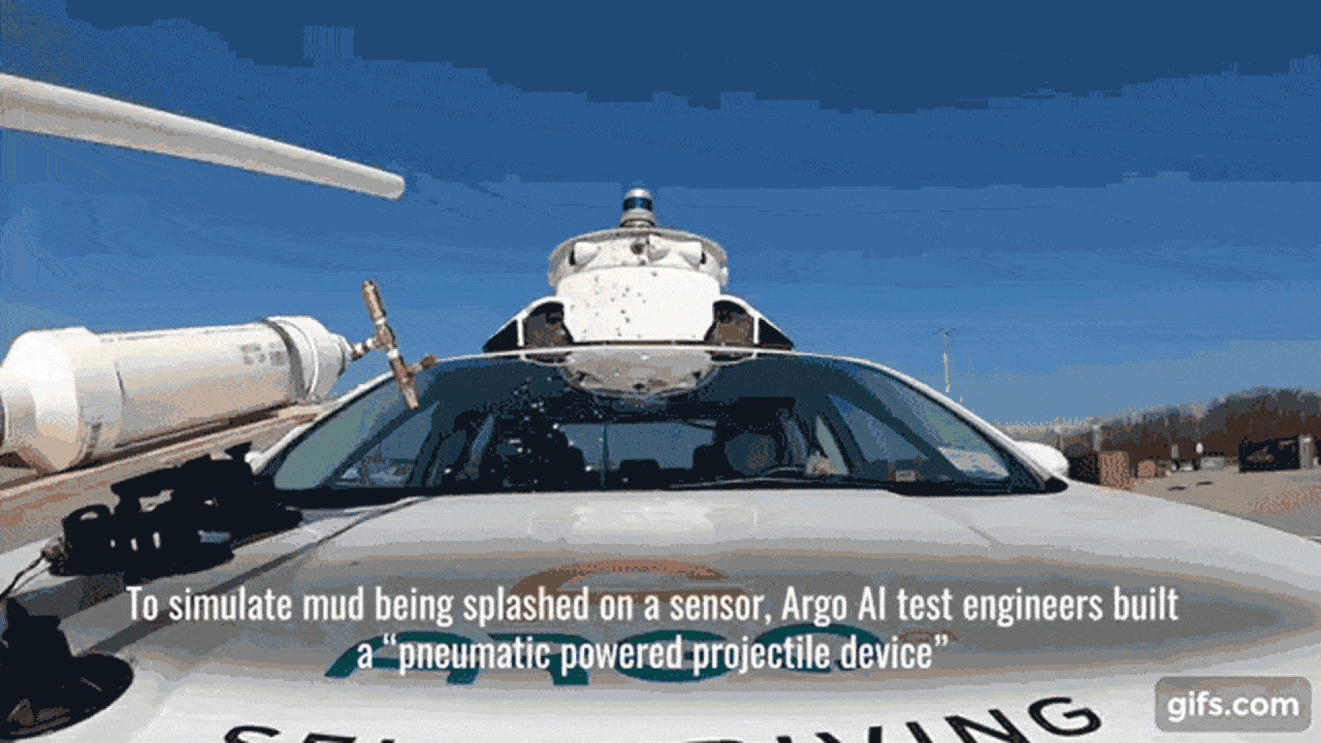 Animated GIF of a device built by Argo AI test engineers to simulate mud on a car