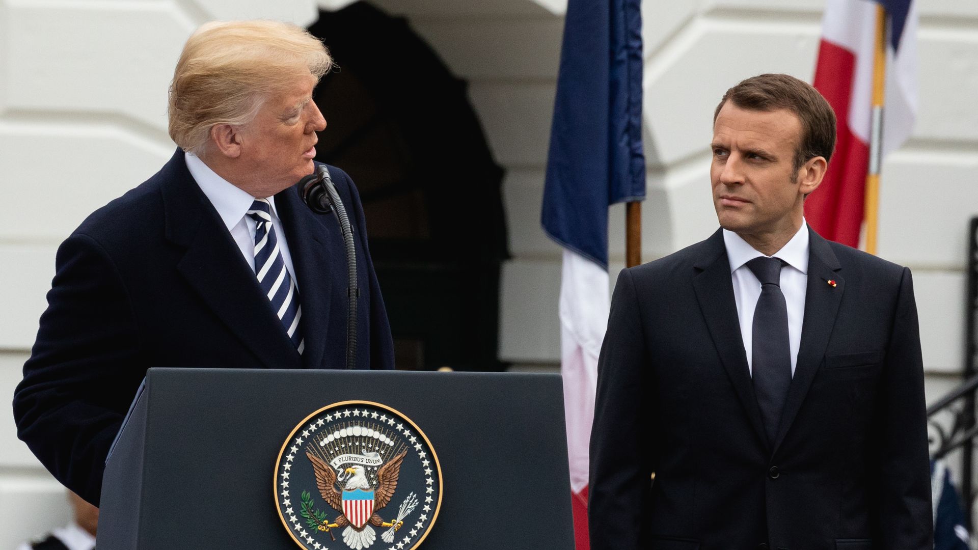 Emmanuel Macron at an event with Trump