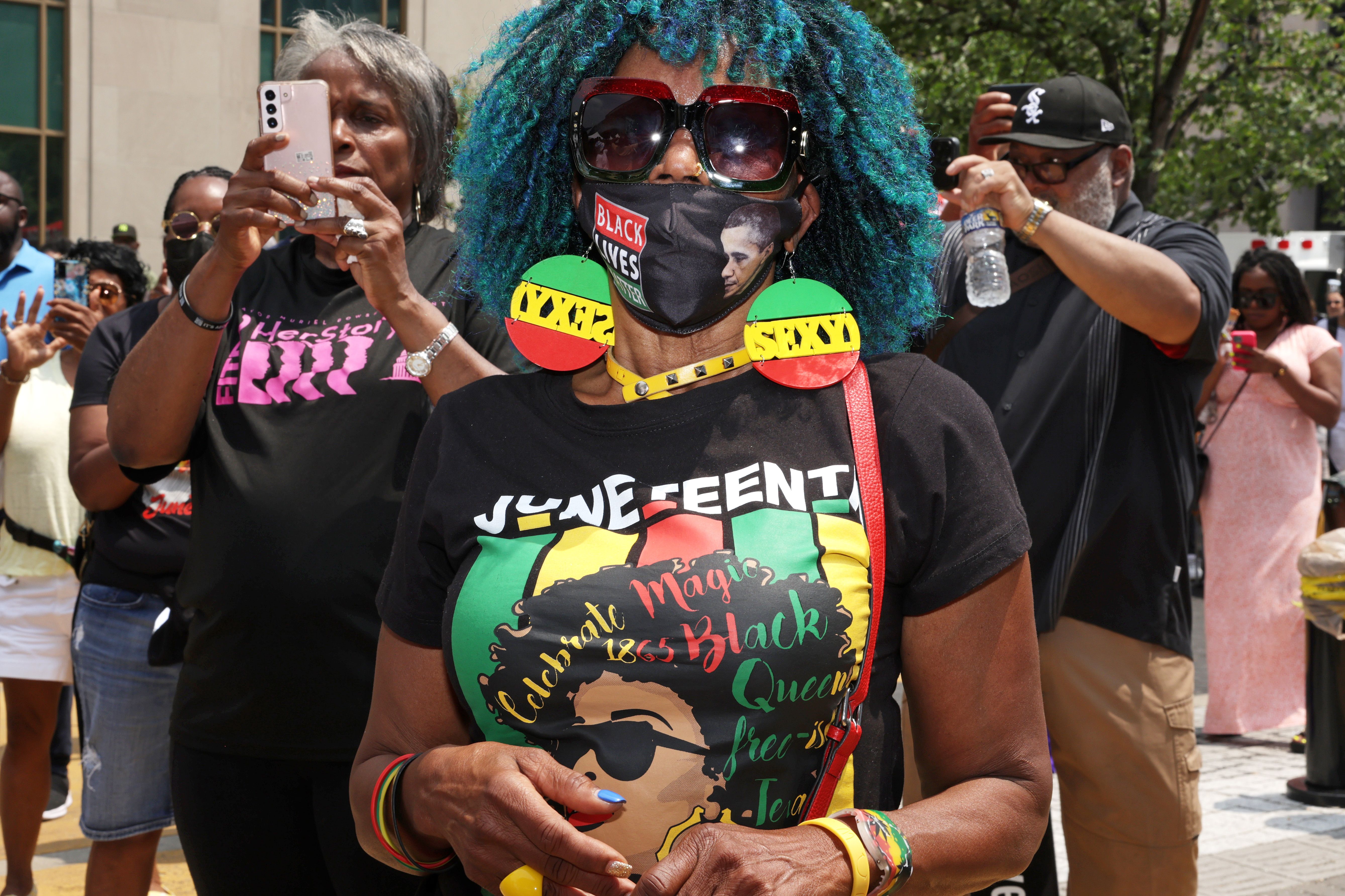 People celebrate Juneteenth during an event at Black Lives Matter Plaza on June 19, 2023 in Washington, DC. 