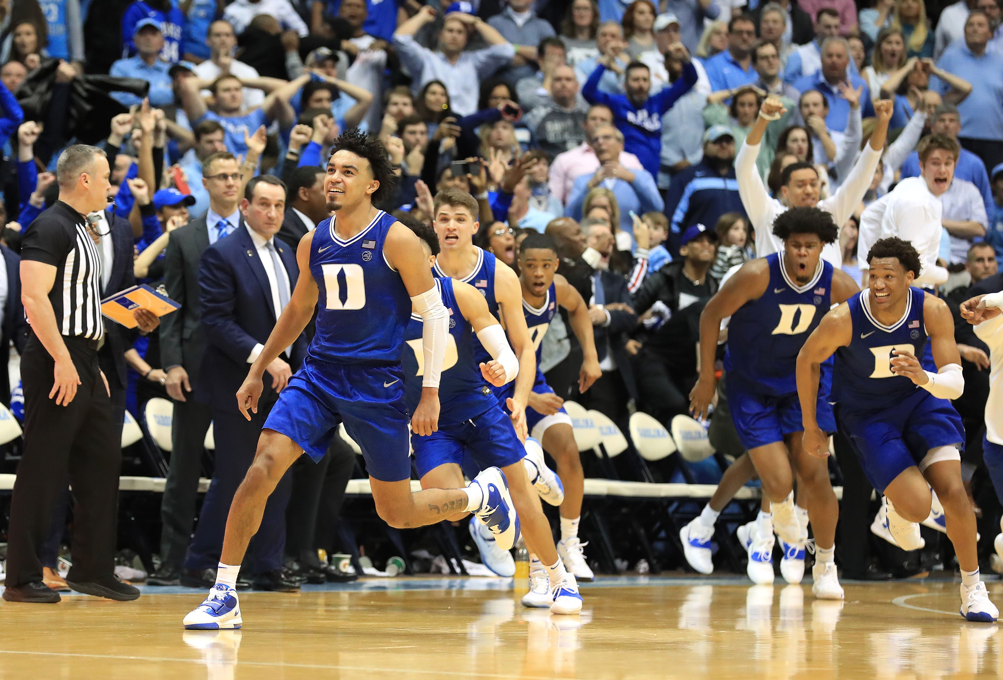 Tre Jones celebrating