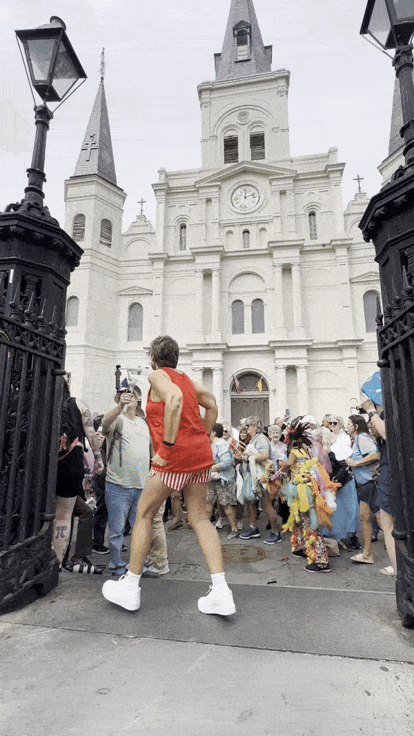 A workout instructor shuffles side to side.