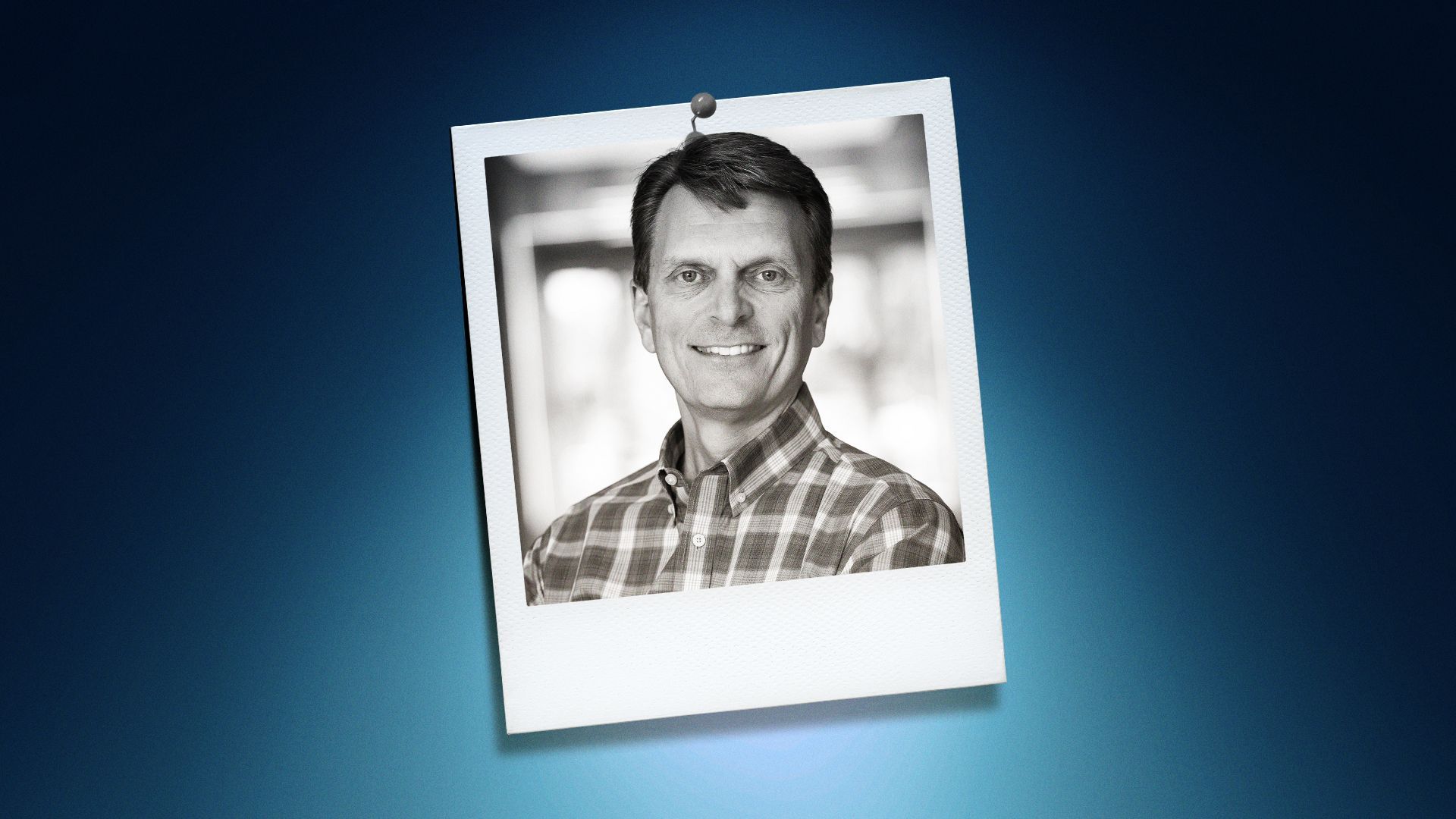 Photo illustration of Mitch Bowling in the center of a Polaroid photo under a blue spotlight.