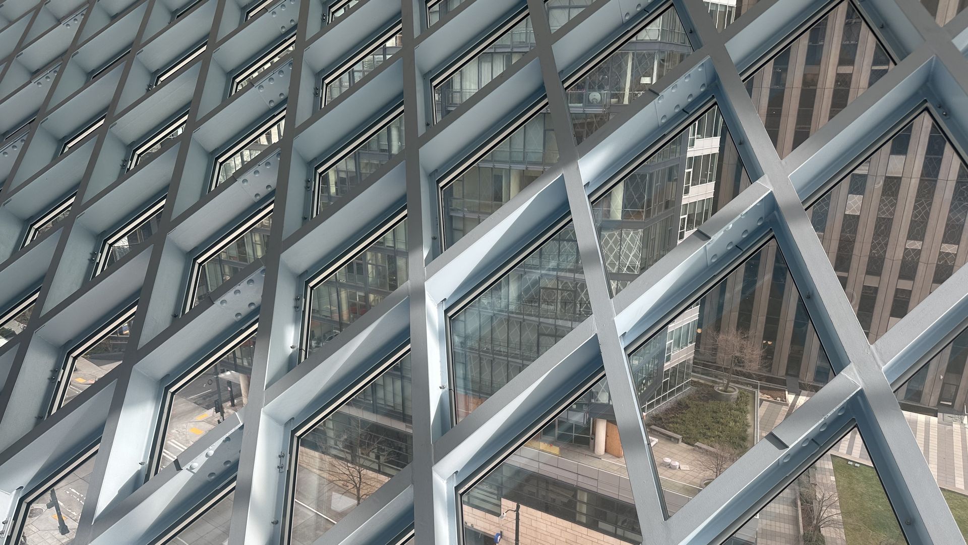 A close-up of a building made with glass walls.
