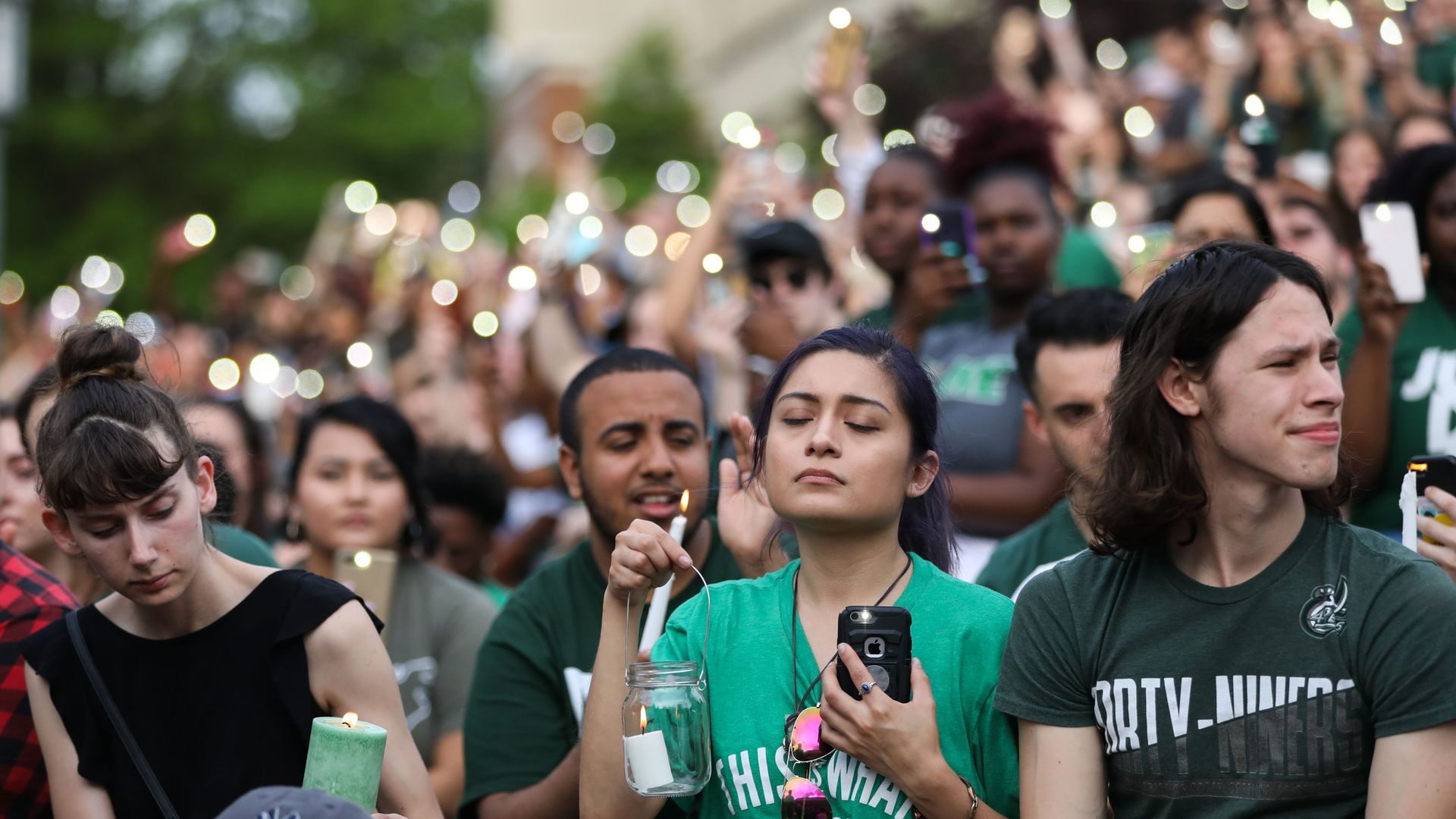  Students and faculty pack into The Star Quad for a candle light vigil in North Carolina on Wednesday.