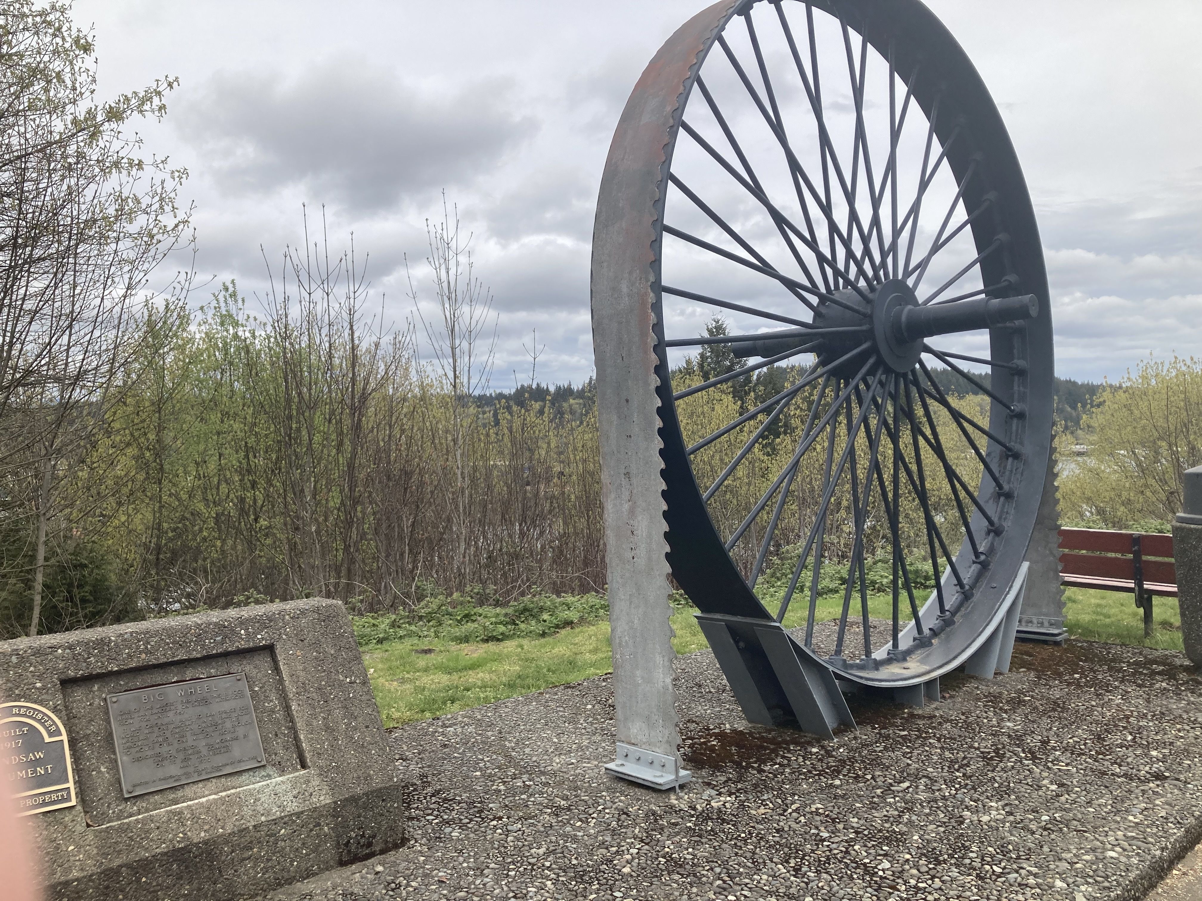 A band saw wheel and blade are on display at Overlook Park in Shelton. 