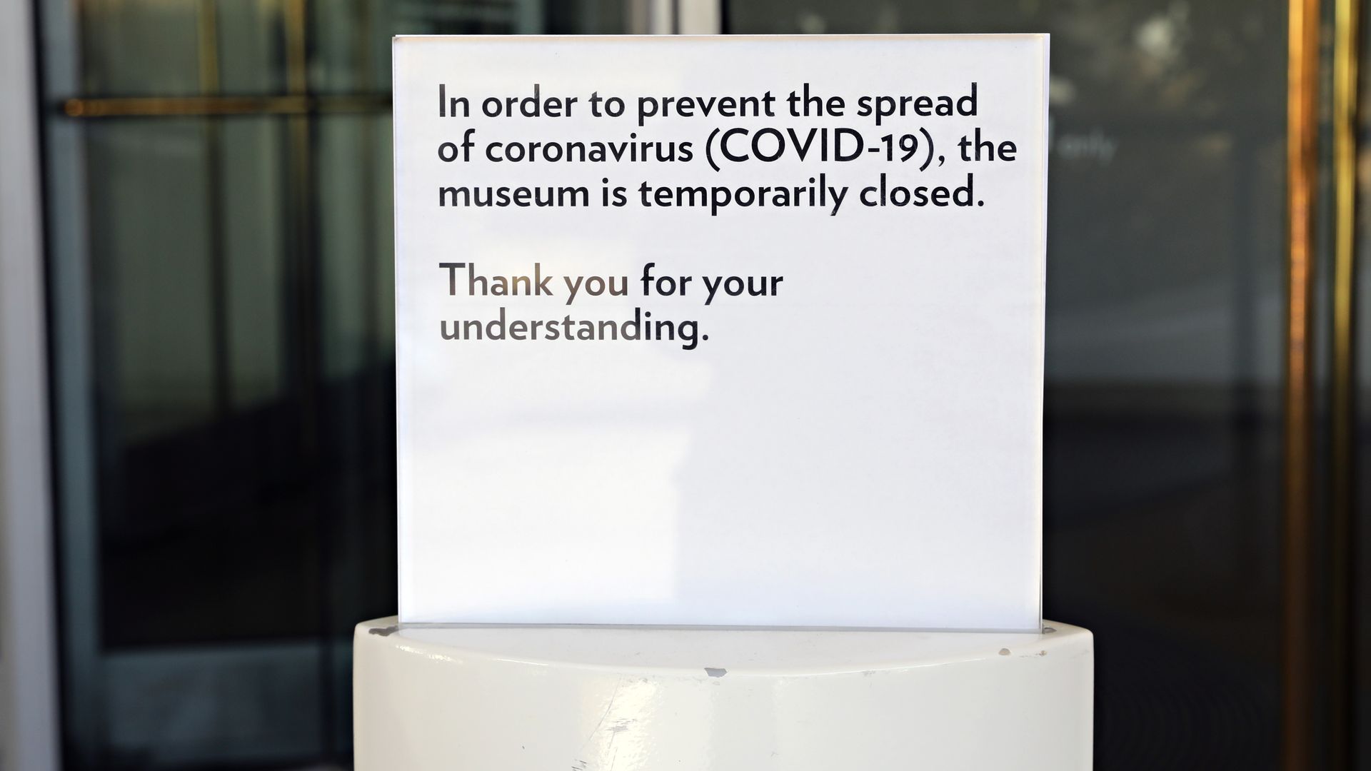 A closed sign is seen outside of Solomon R. Guggenheim Museum of Art