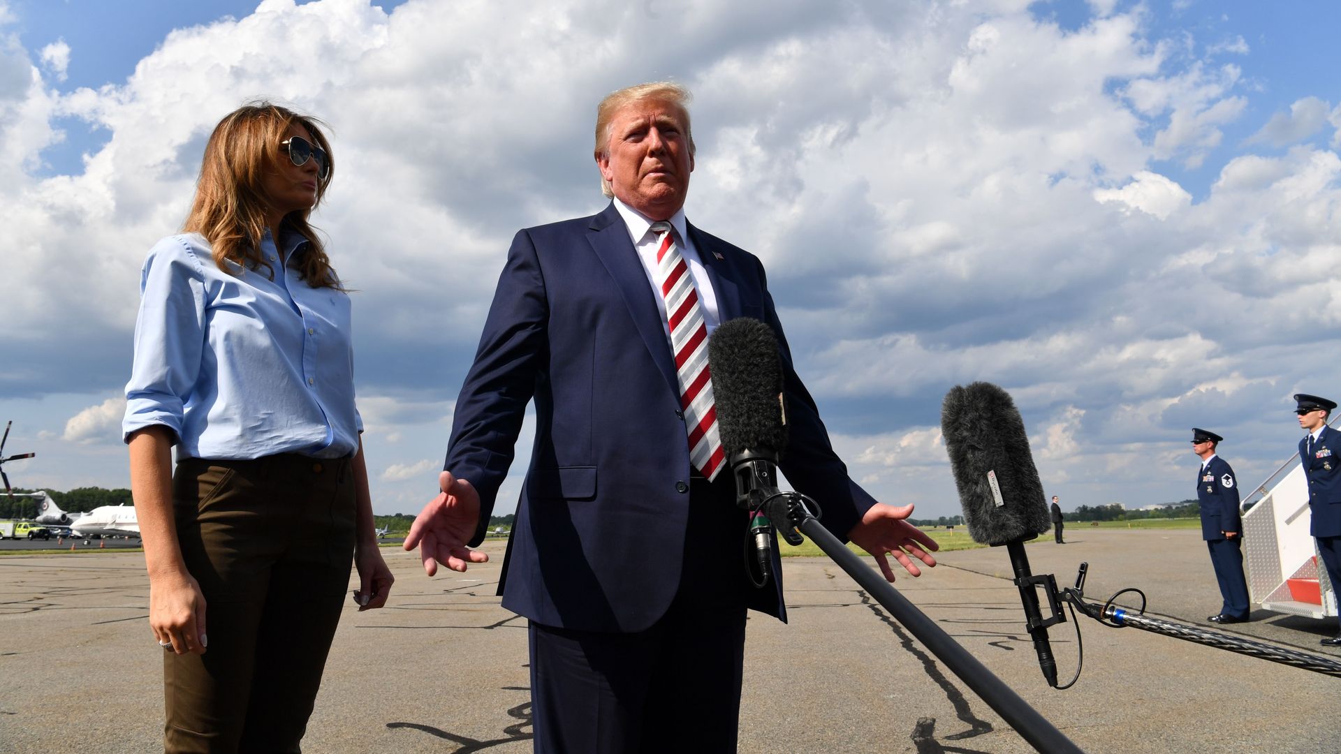 President Donald Trump gives a statement about the recent mass shootings in El Paso and Dayton before boarding to Washington at Morristown Airport on August 04
