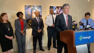 North Carolina Gov. Roy Cooper speaks at a briefing later on Thursday.