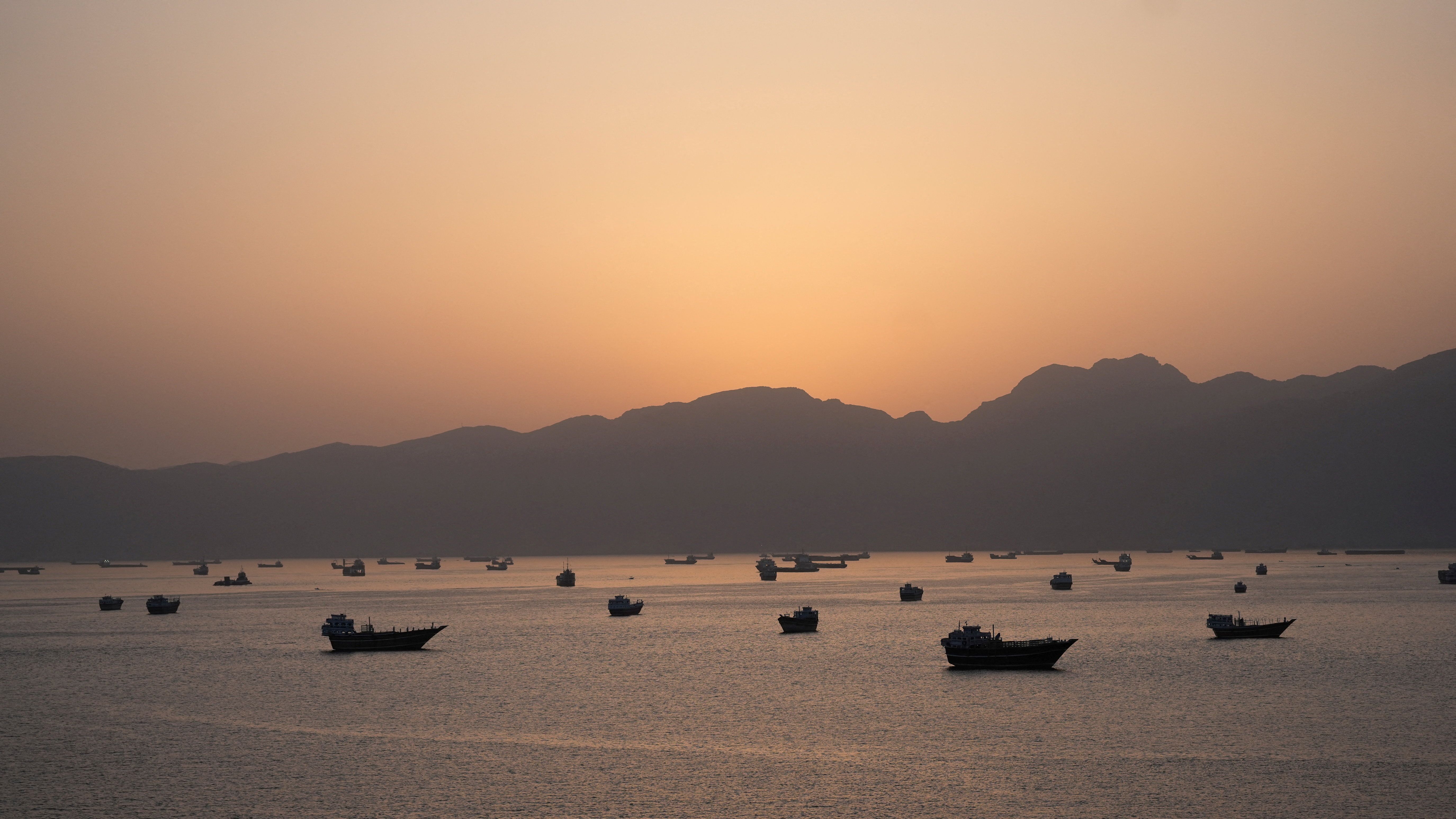Ships and boats in the Strait of Hormuz off Musandam, Oman, on Friday. 