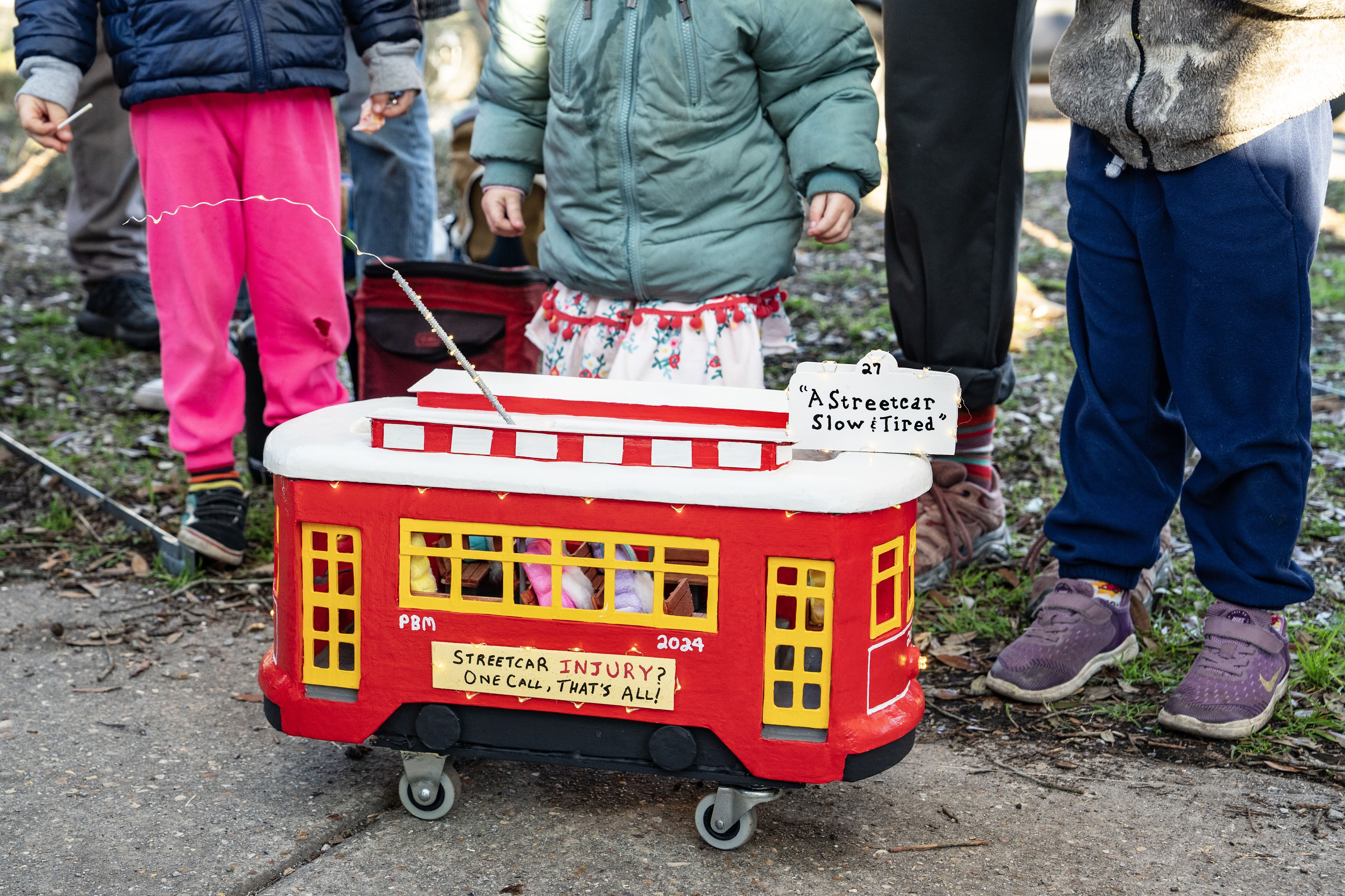 Photo shows a mini streetcar float