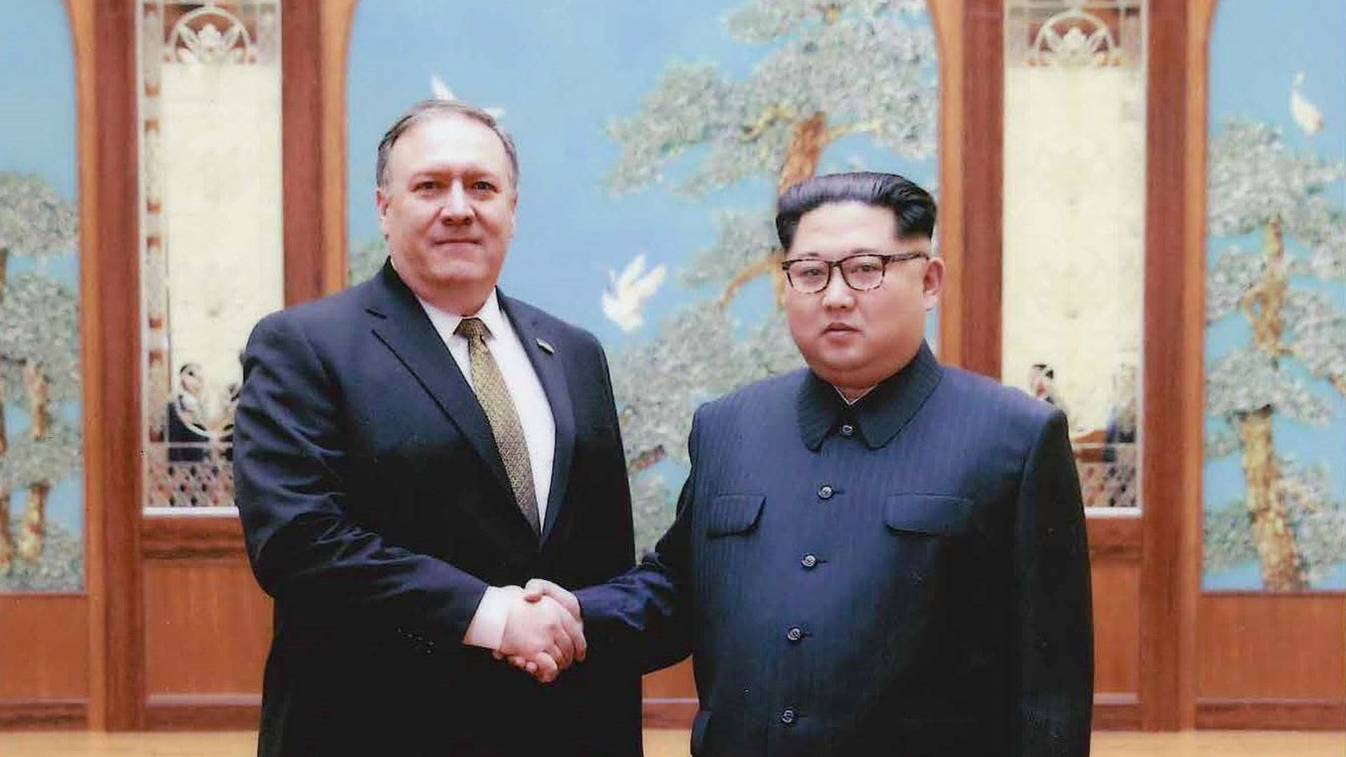 U.S. Secretary of State Mike Pompeo with Kim Jong-un.