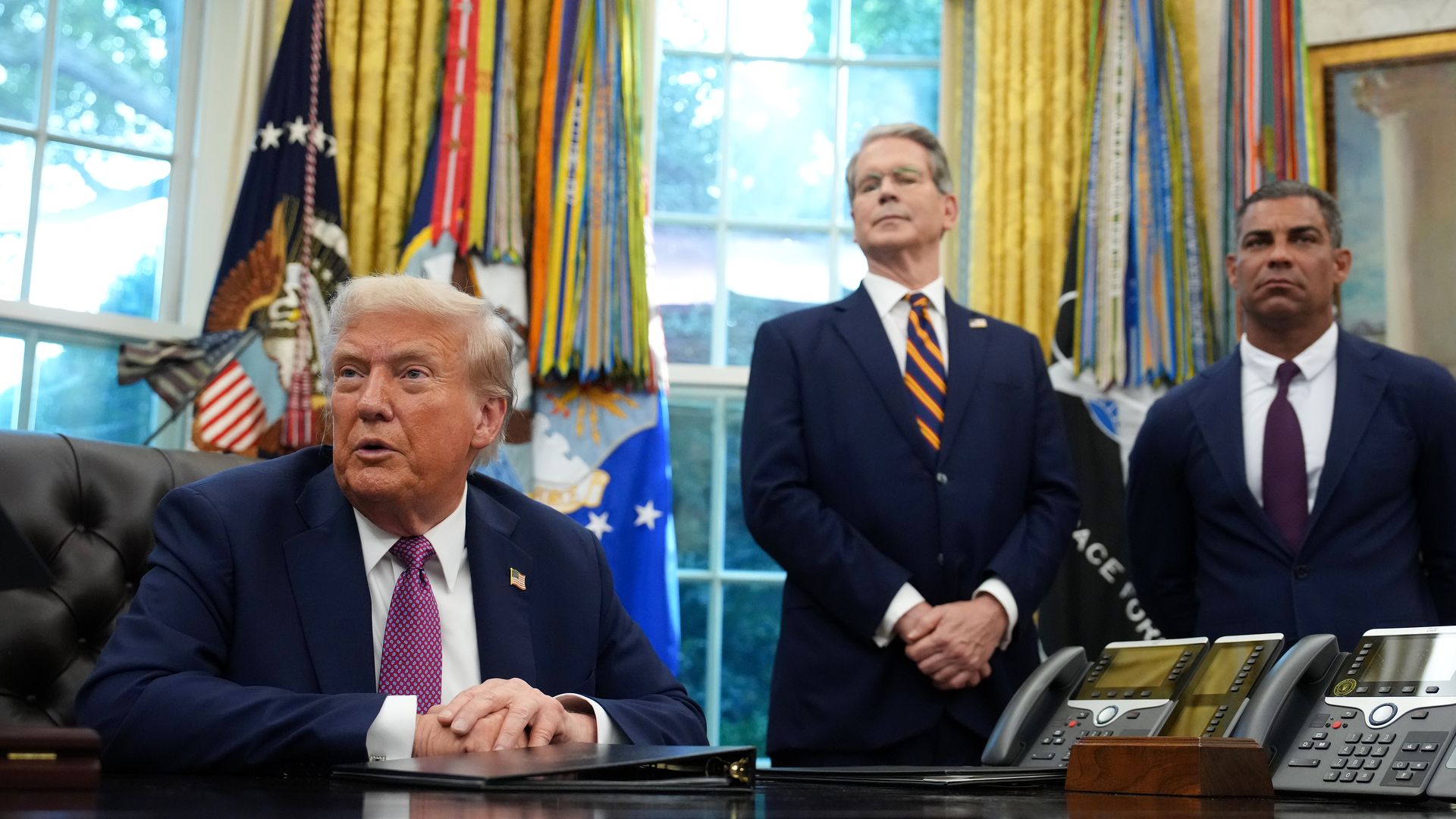 WASHINGTON, DC - SEPTEMBER 05: U.S. President Donald Trump speaks to the media while announcing plans to host the 2026 G20 summit in Miami, Florida as U.S. Treasury Secretary Scott Bessent (C) and Miami Mayor Francis Suarez (R) look on during a press availability in the Oval Office of the White Hous