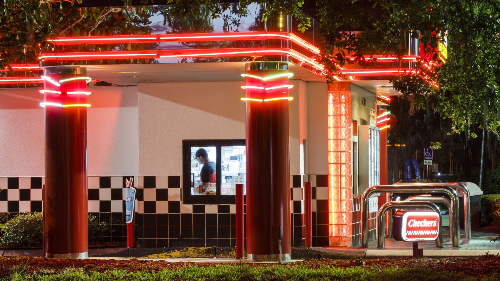 The drive-thru window of a Checkers fast-food restaurant.