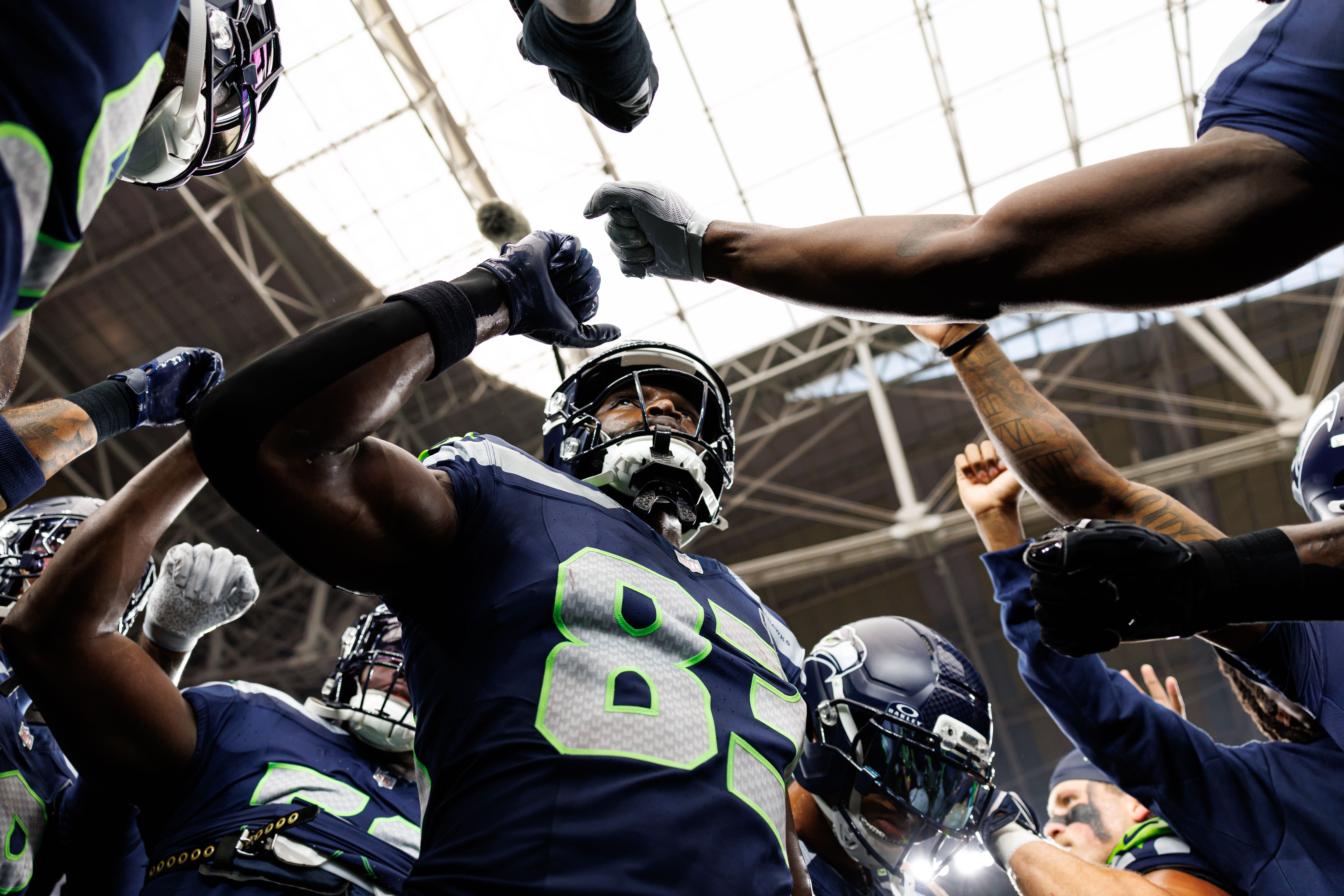  Dareke Young #83 of the Seattle Seahawks stands in a huddle prior to an NFL football game against the Arizona Cardinals at State Farm Stadium on September 25, 2025 in Glendale, Arizona. (Photo by Brooke Sutton/Getty Images)
