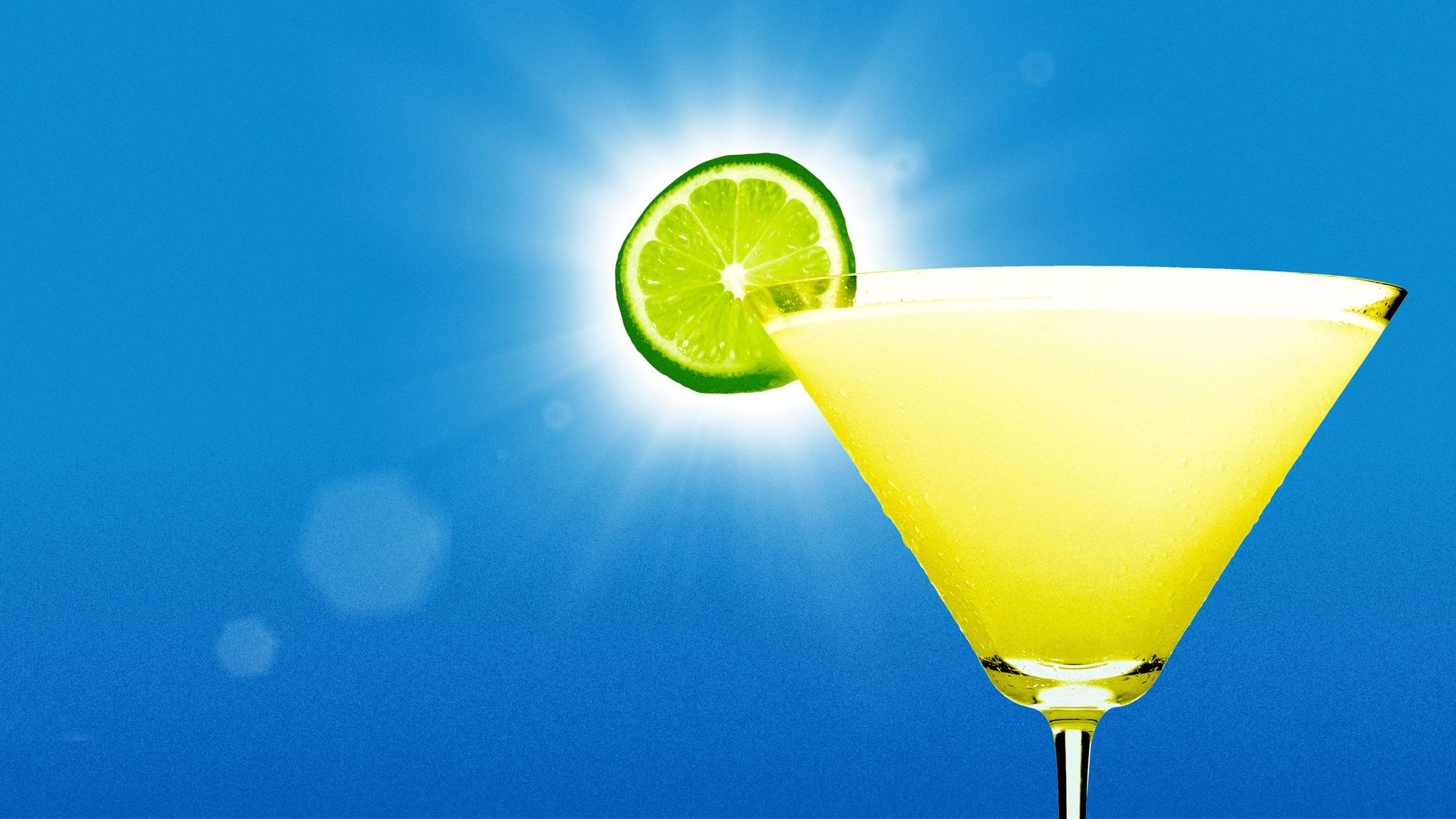 Illustration of a margarita with a lime that is shining like the sun. 
