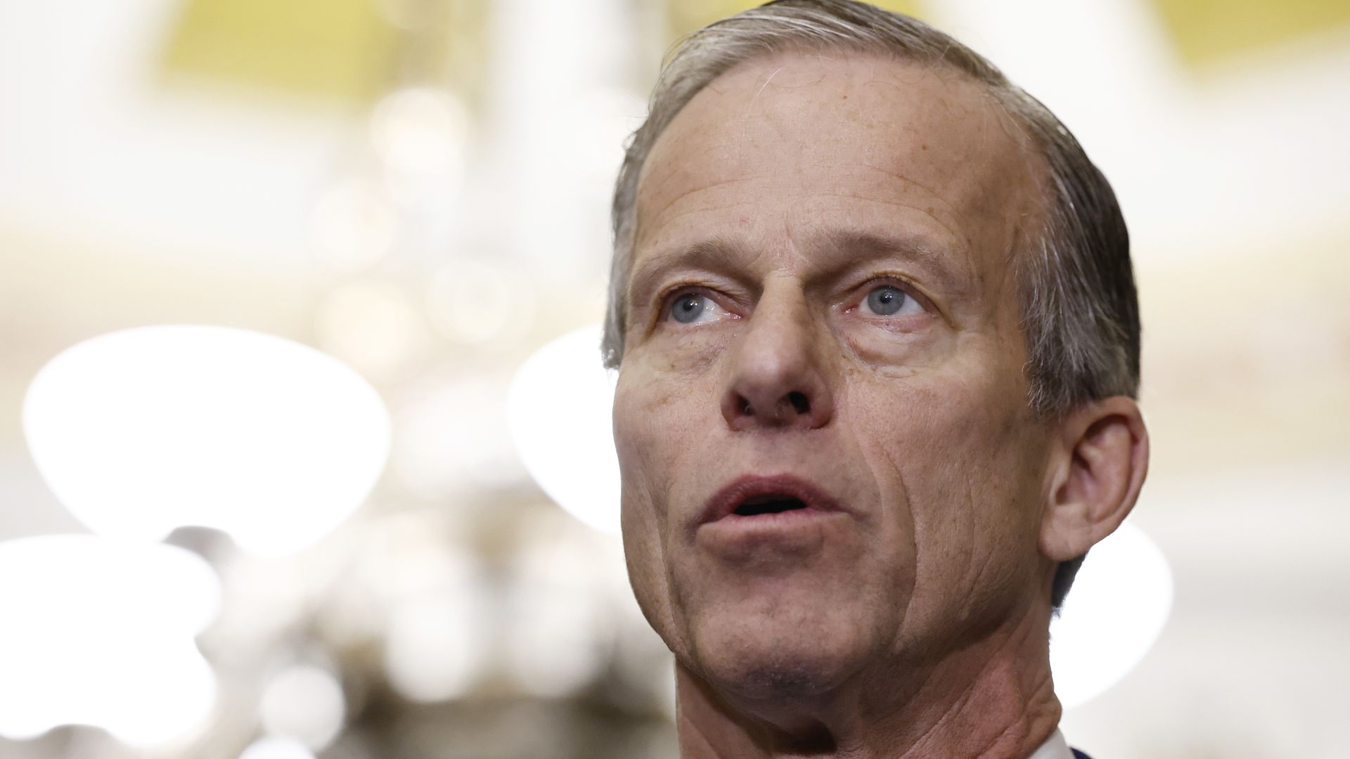 Senator John Thune talks to reporters