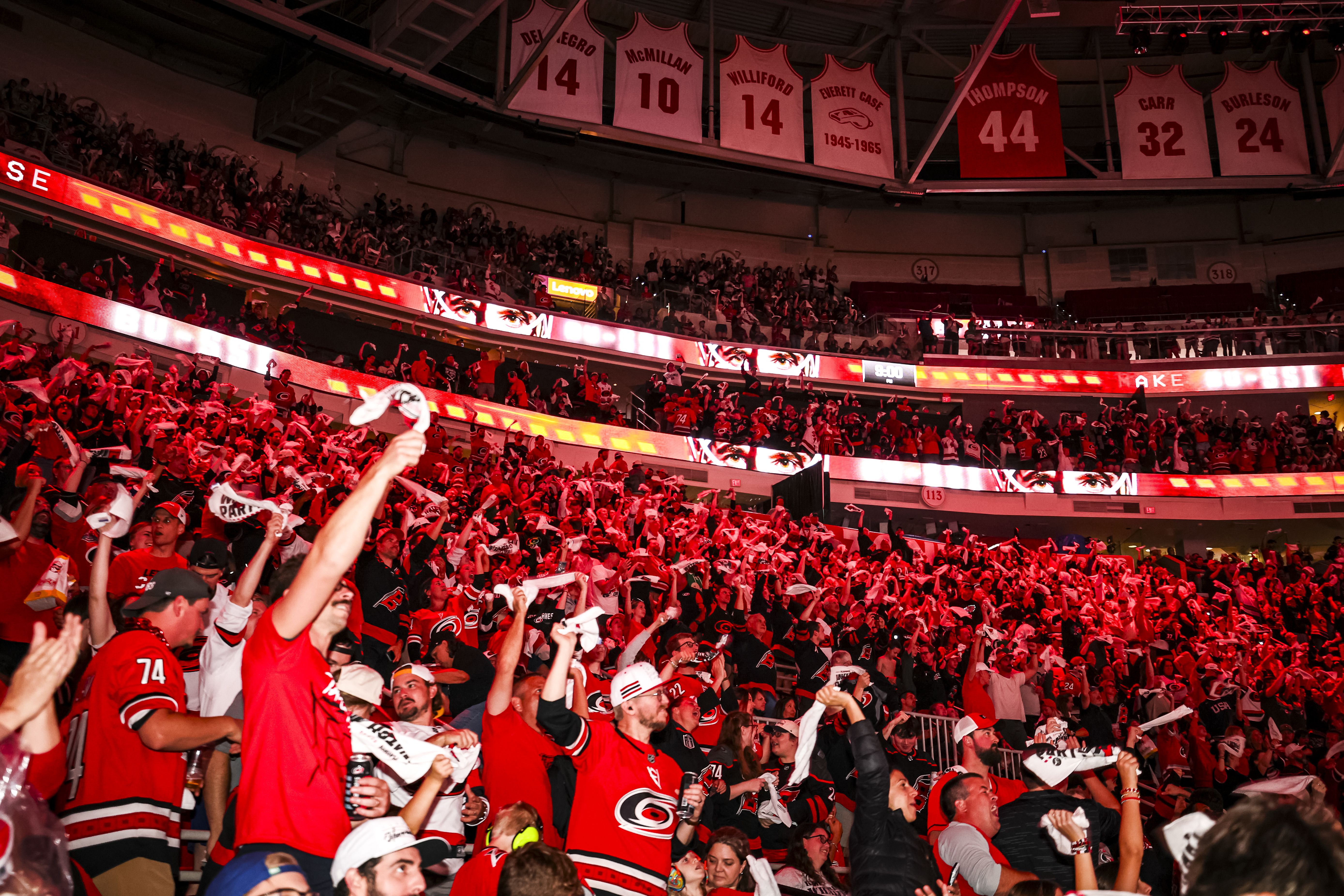 RALEIGH, NORTH CAROLINA - JUNE 14: Fans cheer at the Hurricanes Watch Party for Game Six of the 2026 Stanley Cup Final at Lenovo Center in Raleigh.