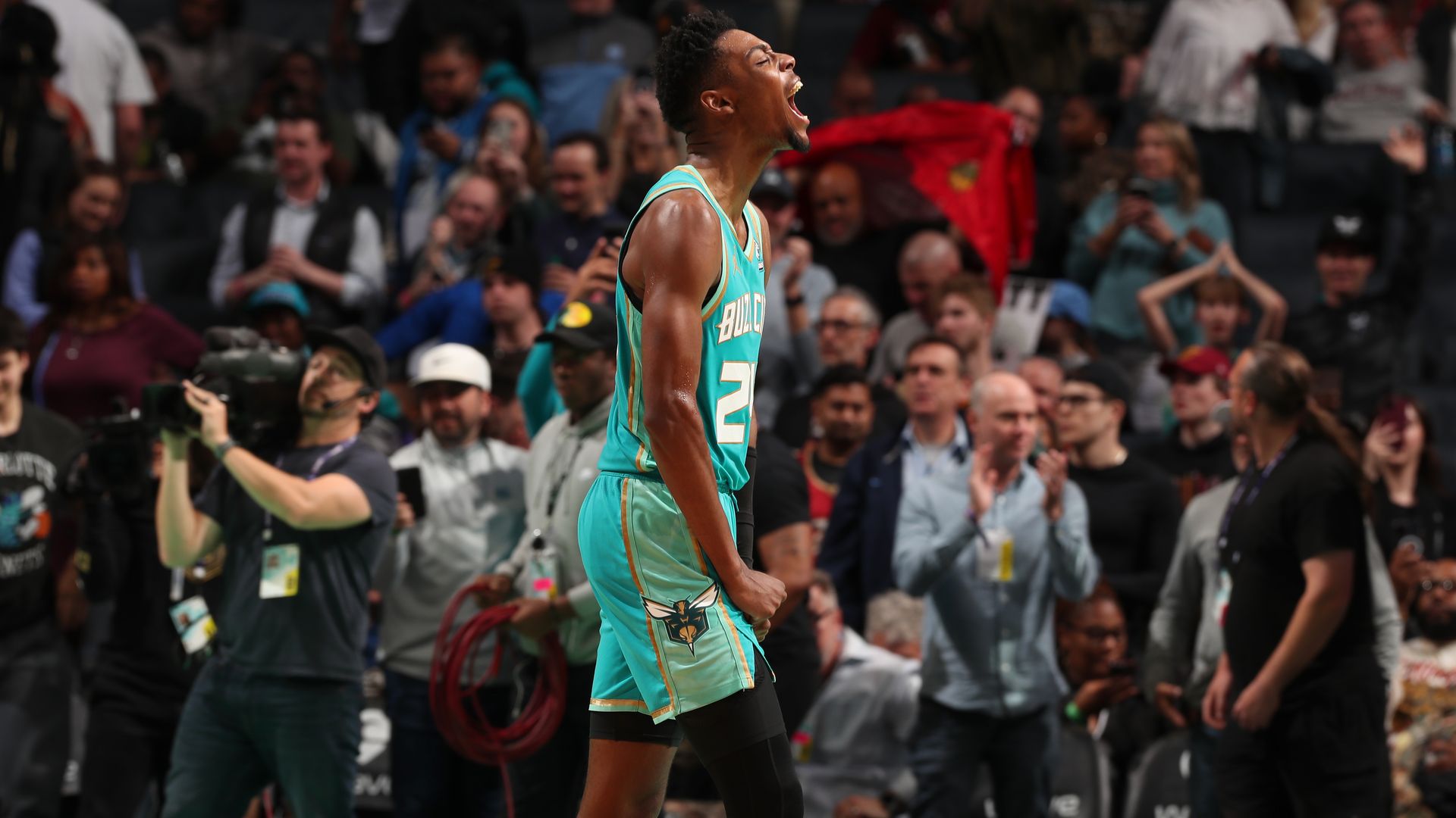 Charlotte Hornets player Brandon Miller celebrates at Spectrum Center. 