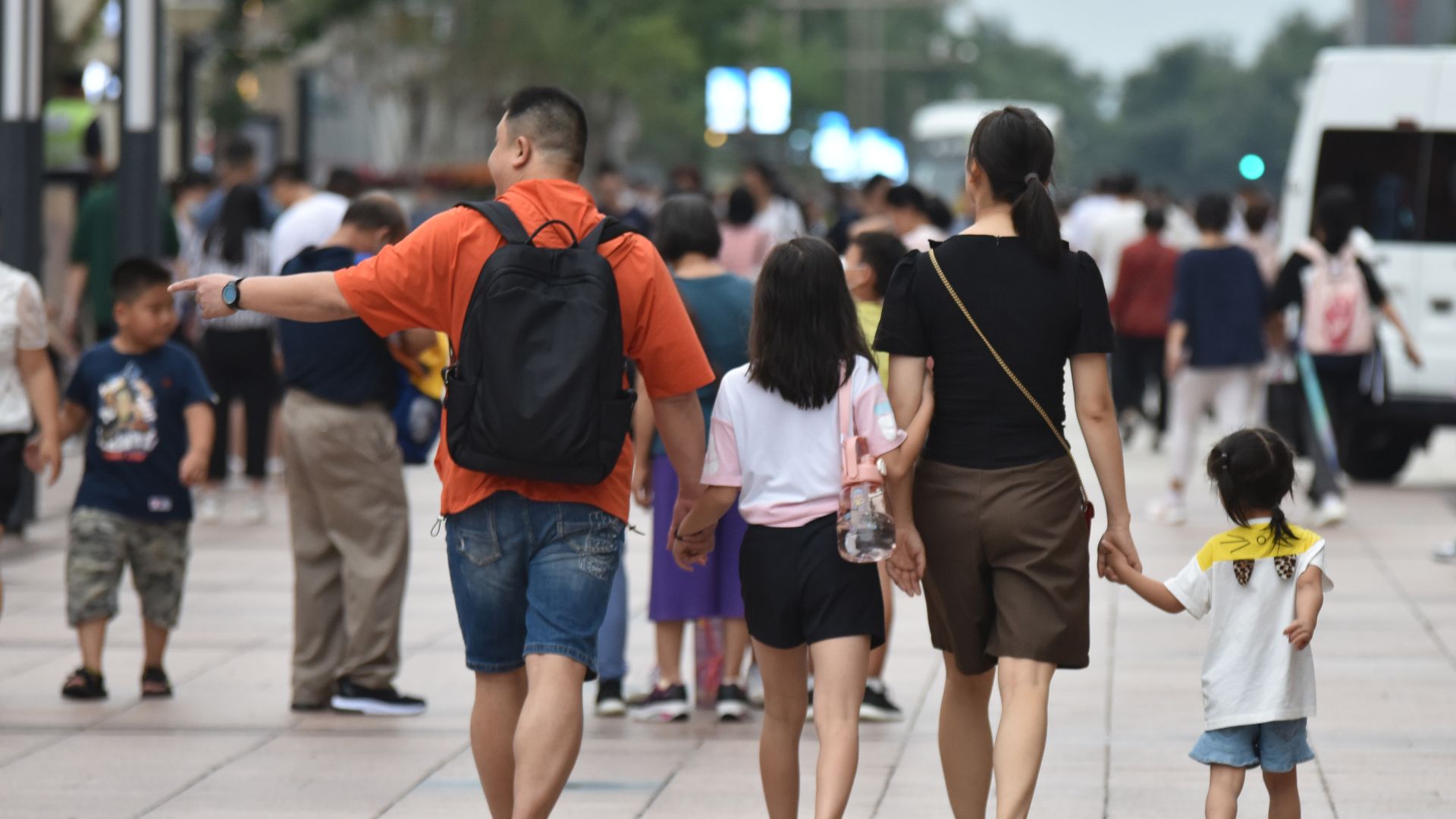 Picture of a family walking in China