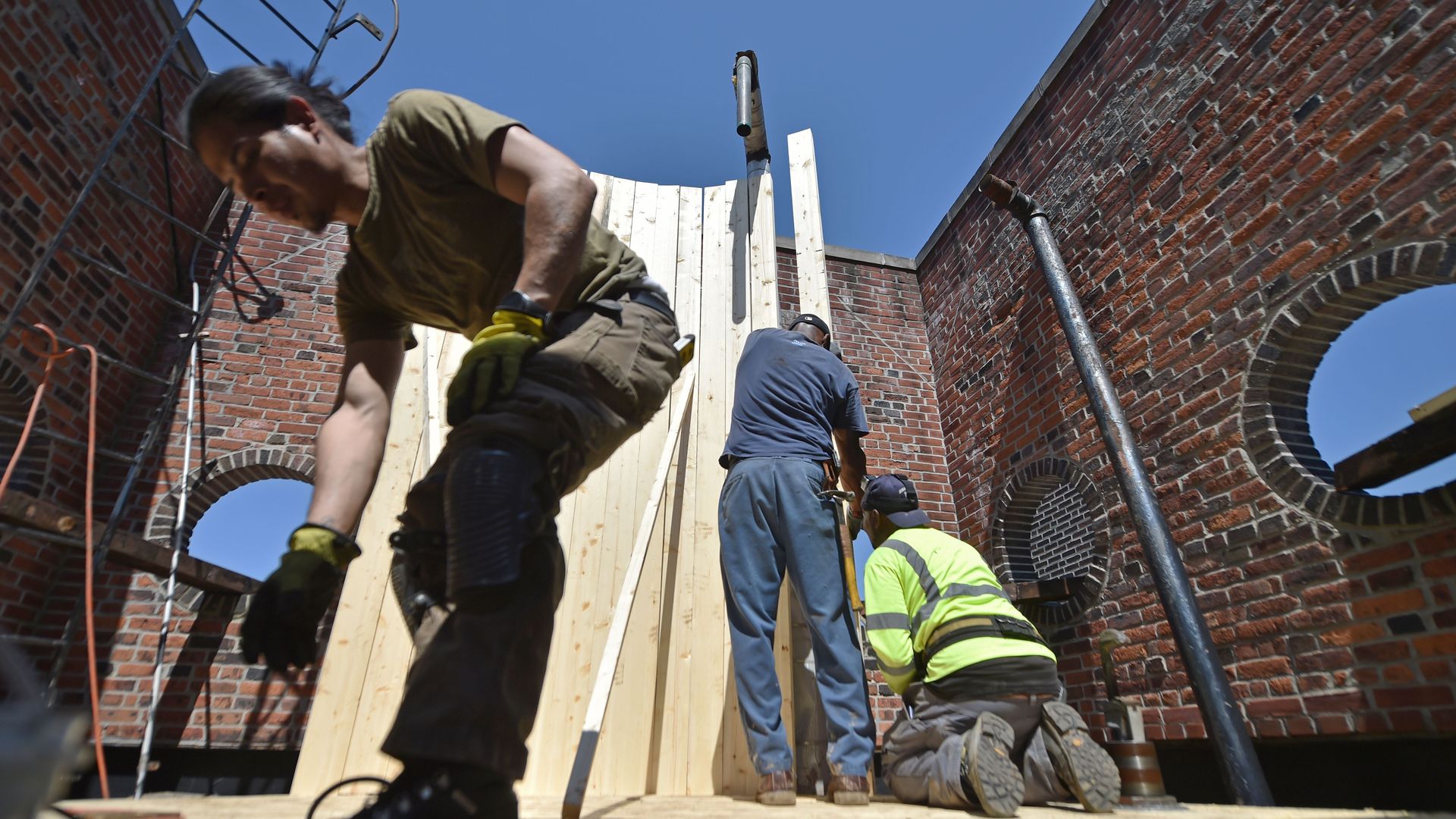 Construction workers in New York. Photo: Hector Retamal/AFP/Getty Images