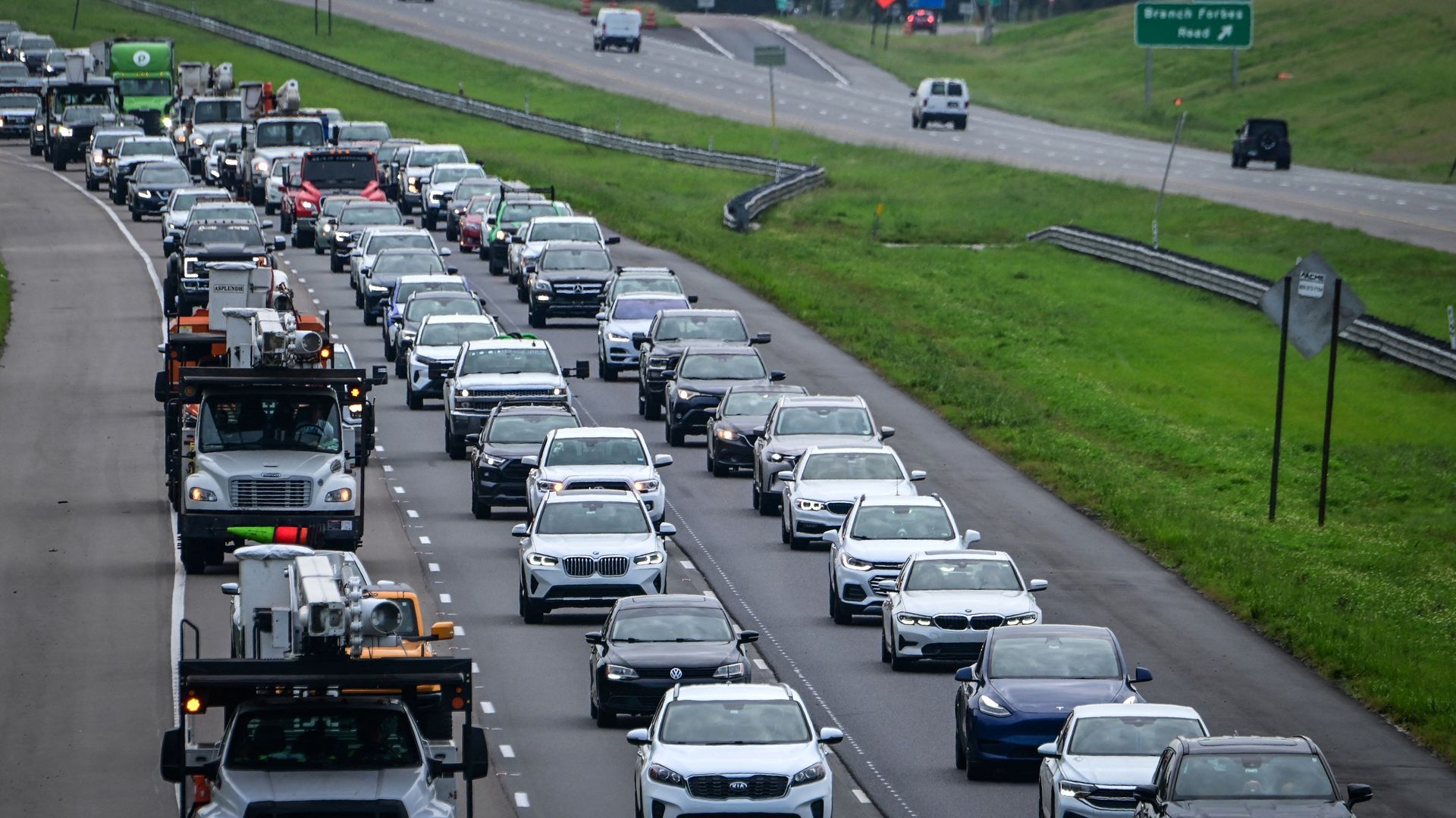 Heavy traffic moves along Interstate 4 toward Tampa after Hurricane Milton.