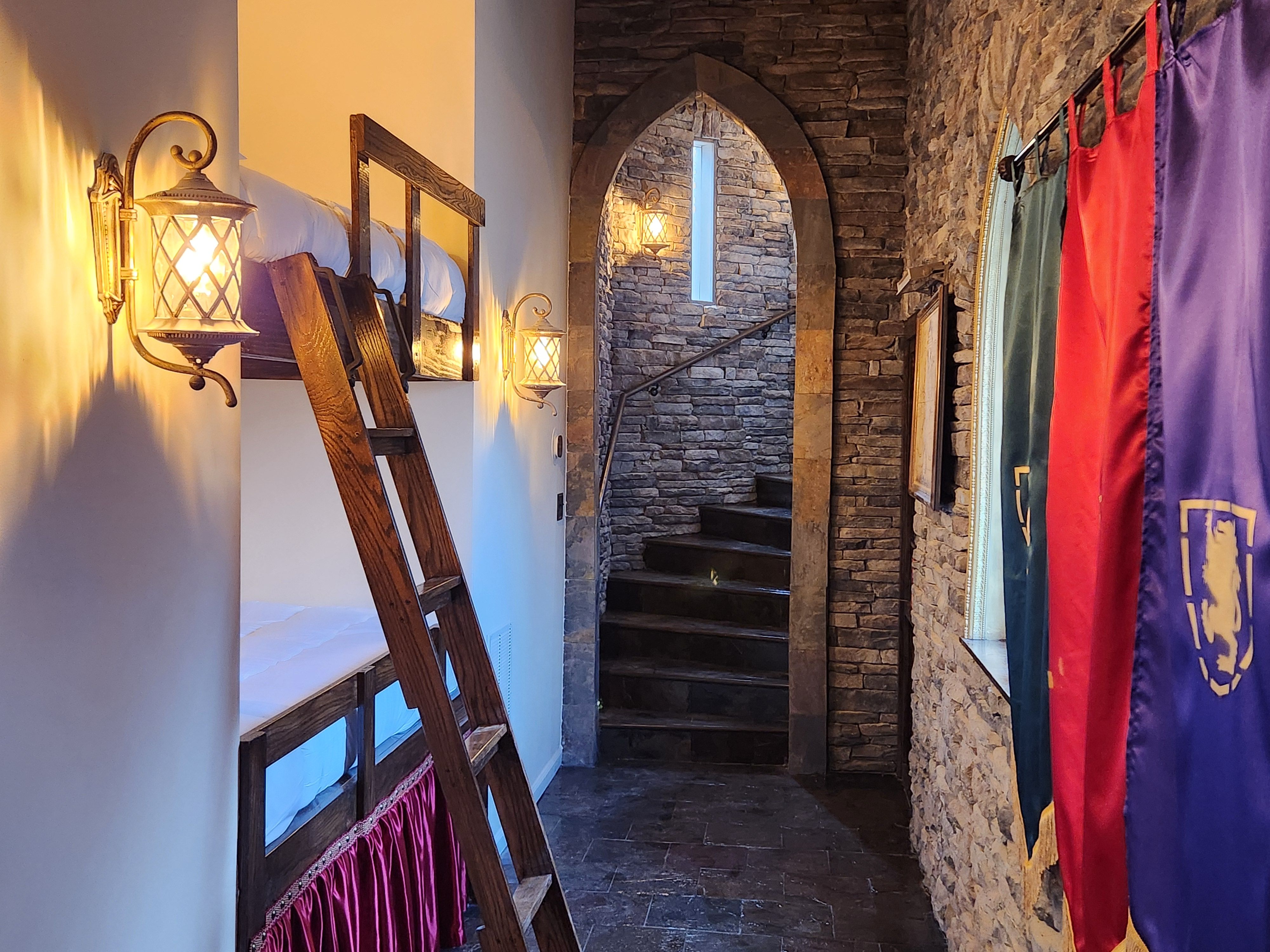 Bunkbeds are located on the first floor before the stairwell at The Castle at Kingston.