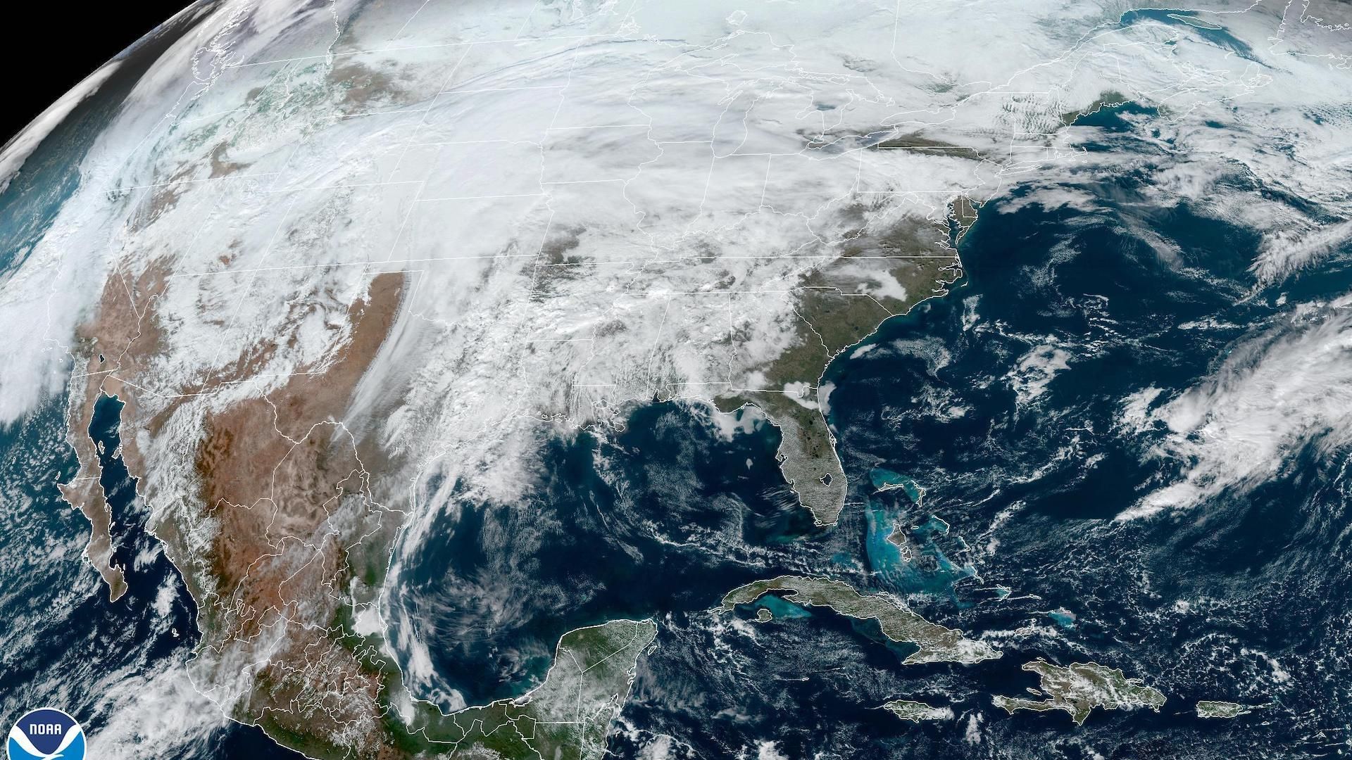 Satellite view of the sprawling storm affecting the Plains to the Midwest south to the Gulf Coast on Monday.