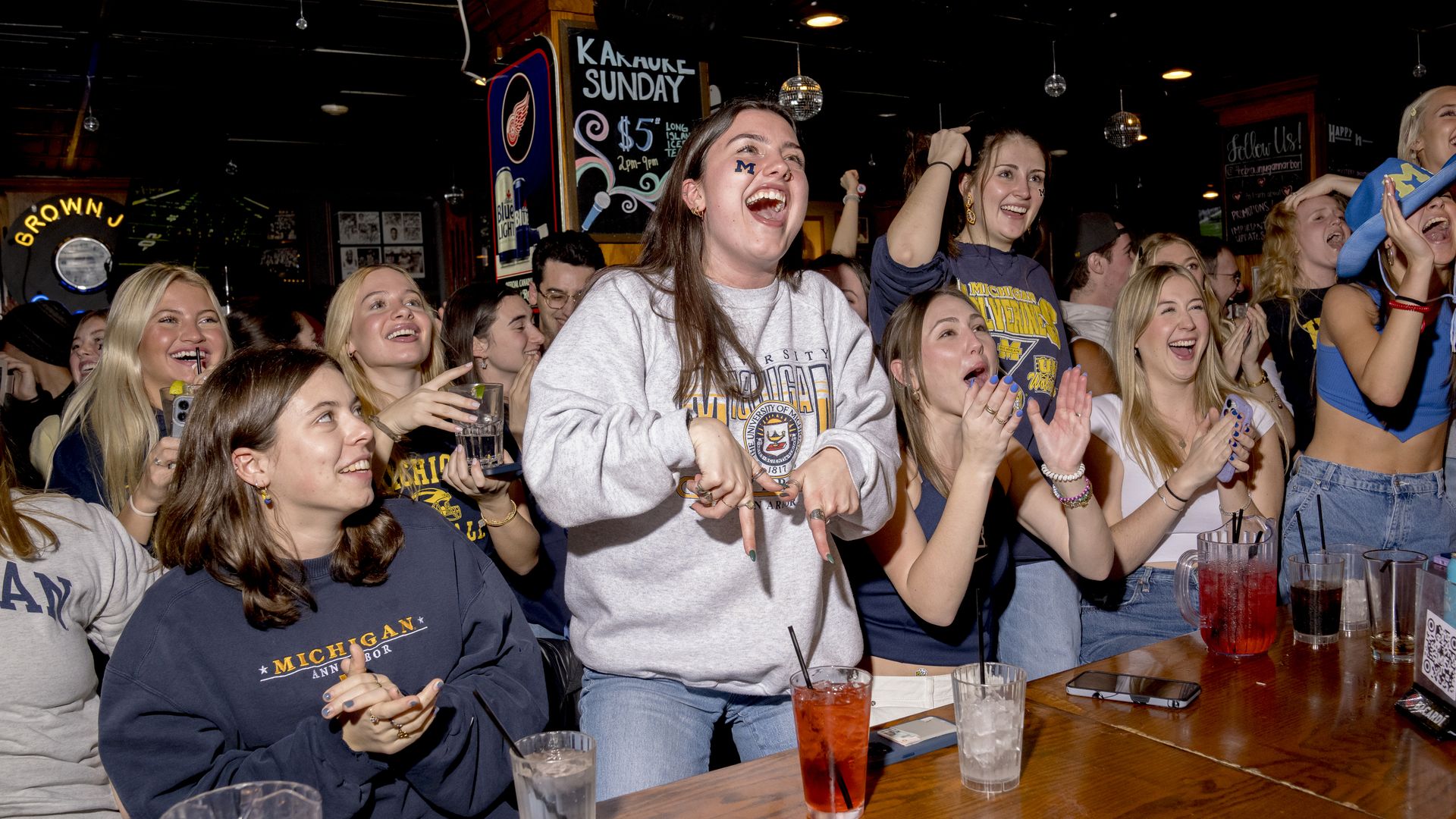 Michigan Wolverines fans react while watching the 2024 College Football Playoff National Championship Game against the Washington Huskies on Jan. 08, at the Brown Jug Restaurant in Ann Arbor. (Photo by Nic Antaya/Getty Images)