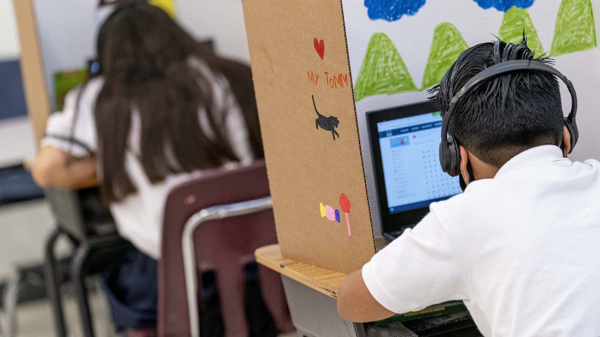 A student studies in a classroom during the pandemic.
