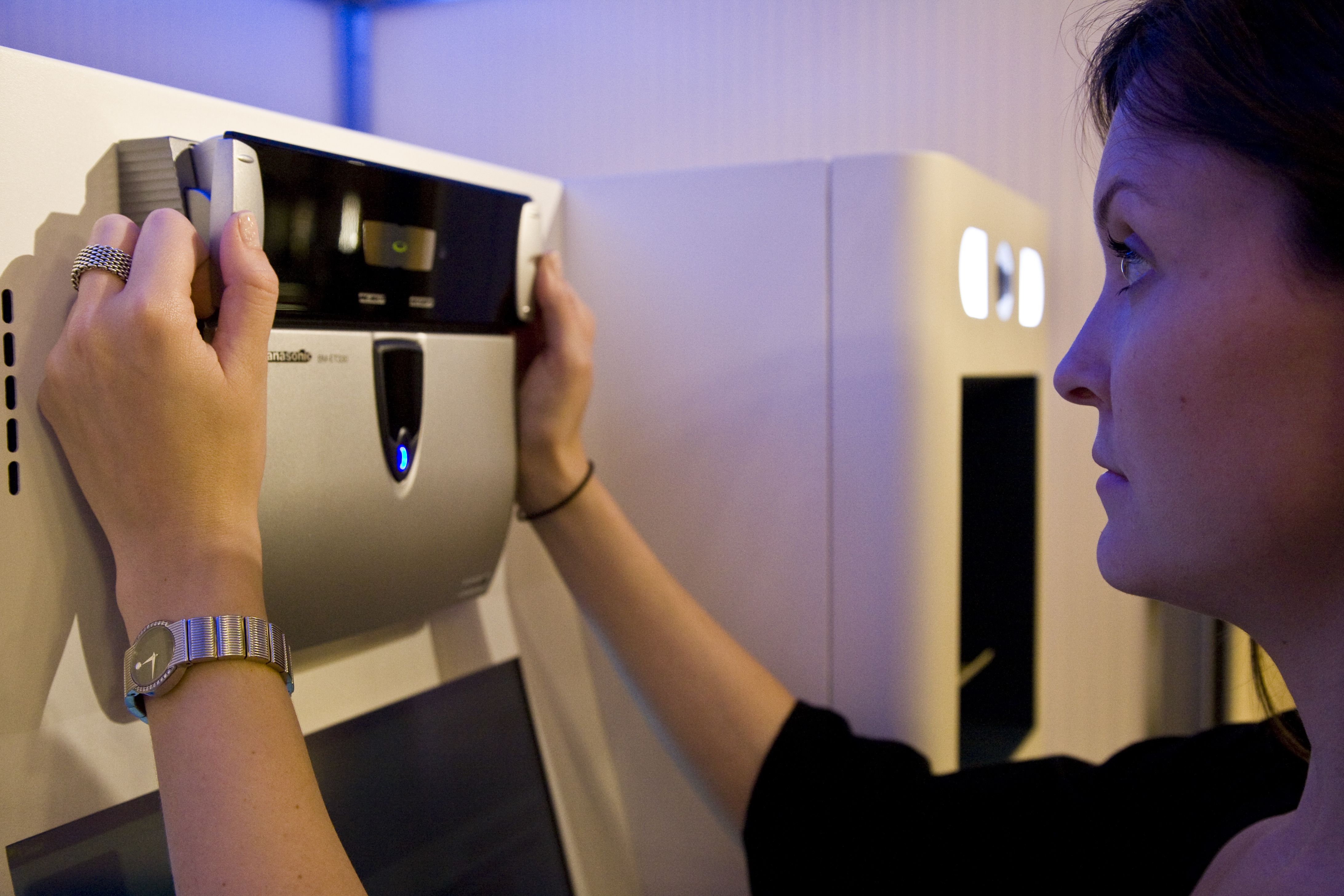 A women getting an iris scan at the airport