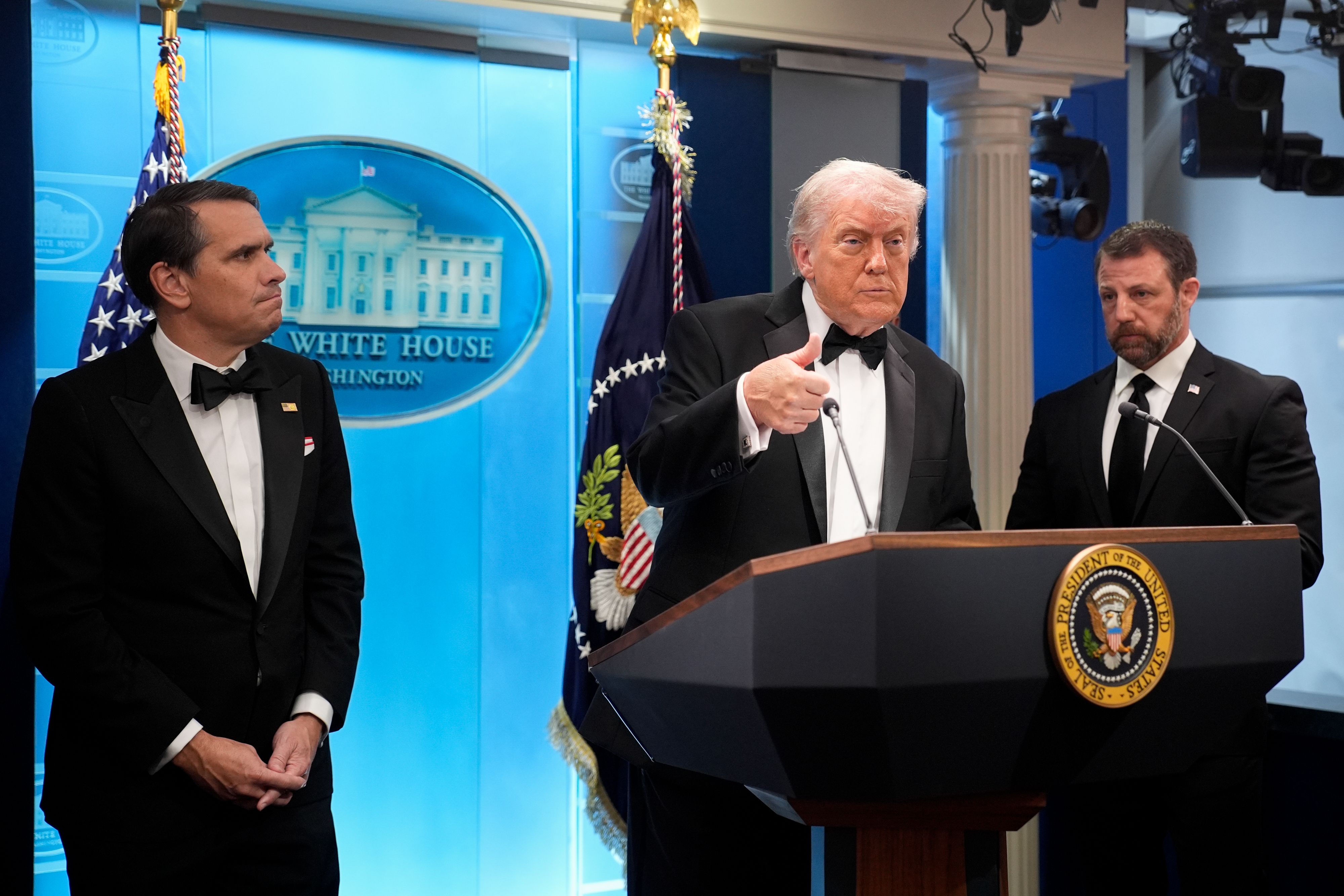 President Trump speaks from the White House briefing room in his tuxedo