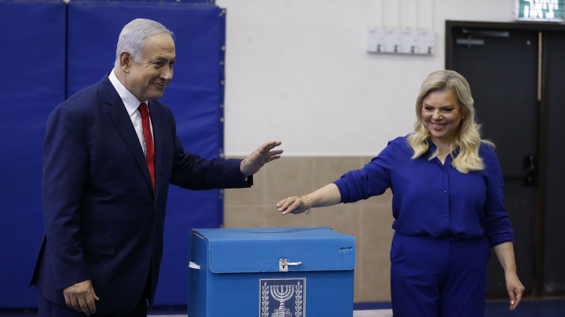 Netanyahu voting with his wife