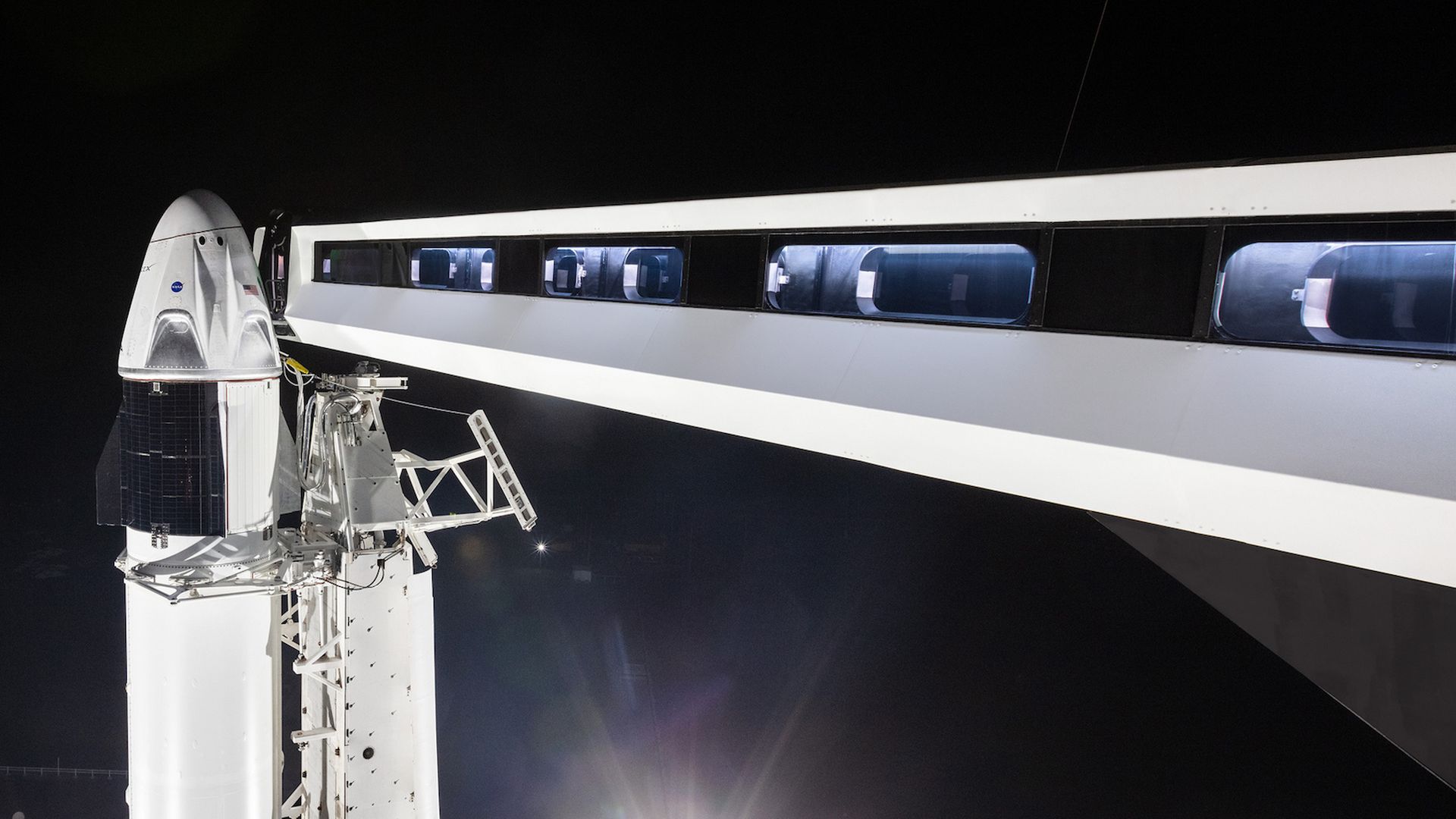 SpaceX's Crew Dragon capsule and walkway rests atop a Falcon 9 rocket in Cape Canaveral, Florida.