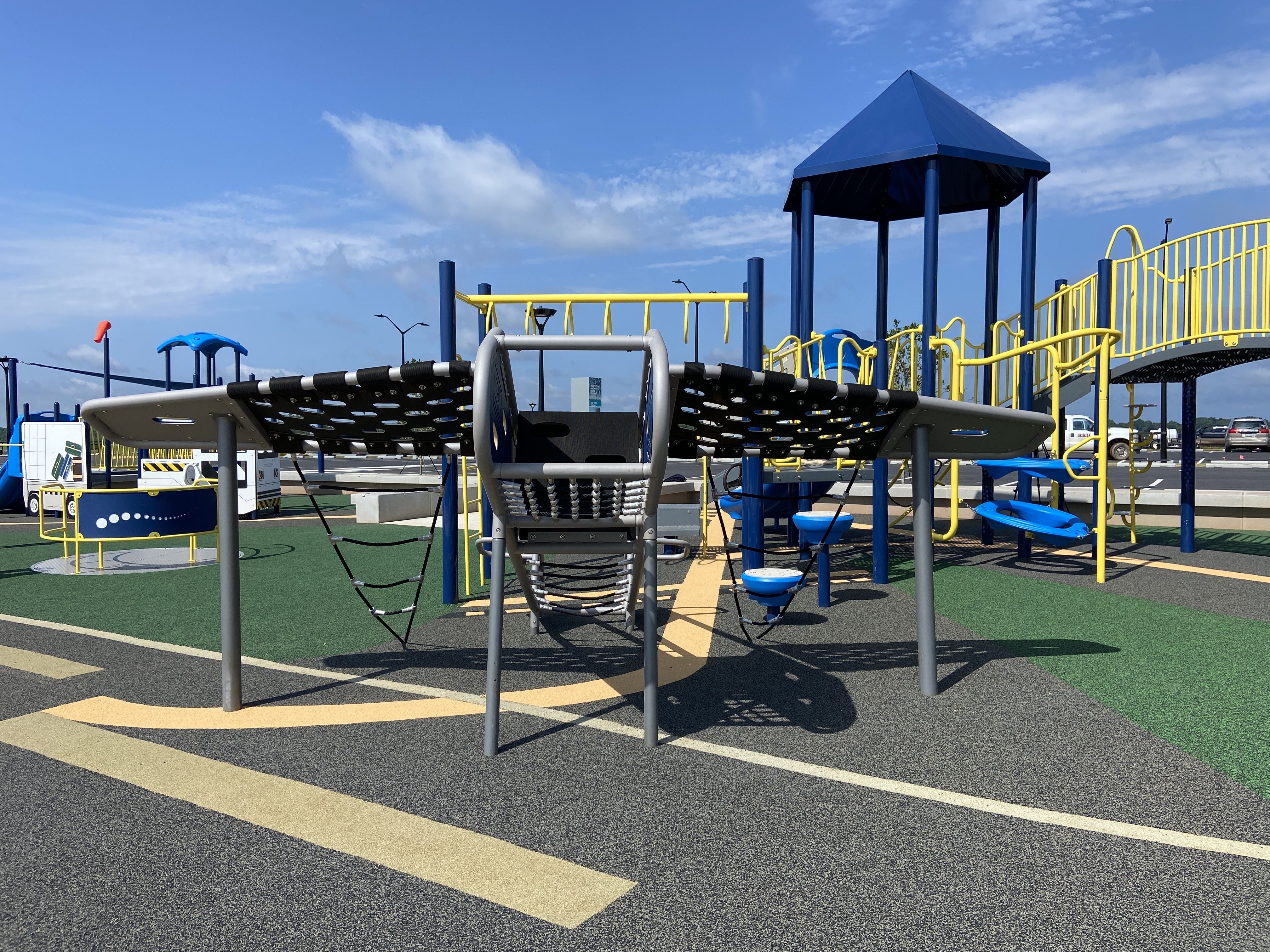 A plane-like climbing structure at the airport overlook playground.