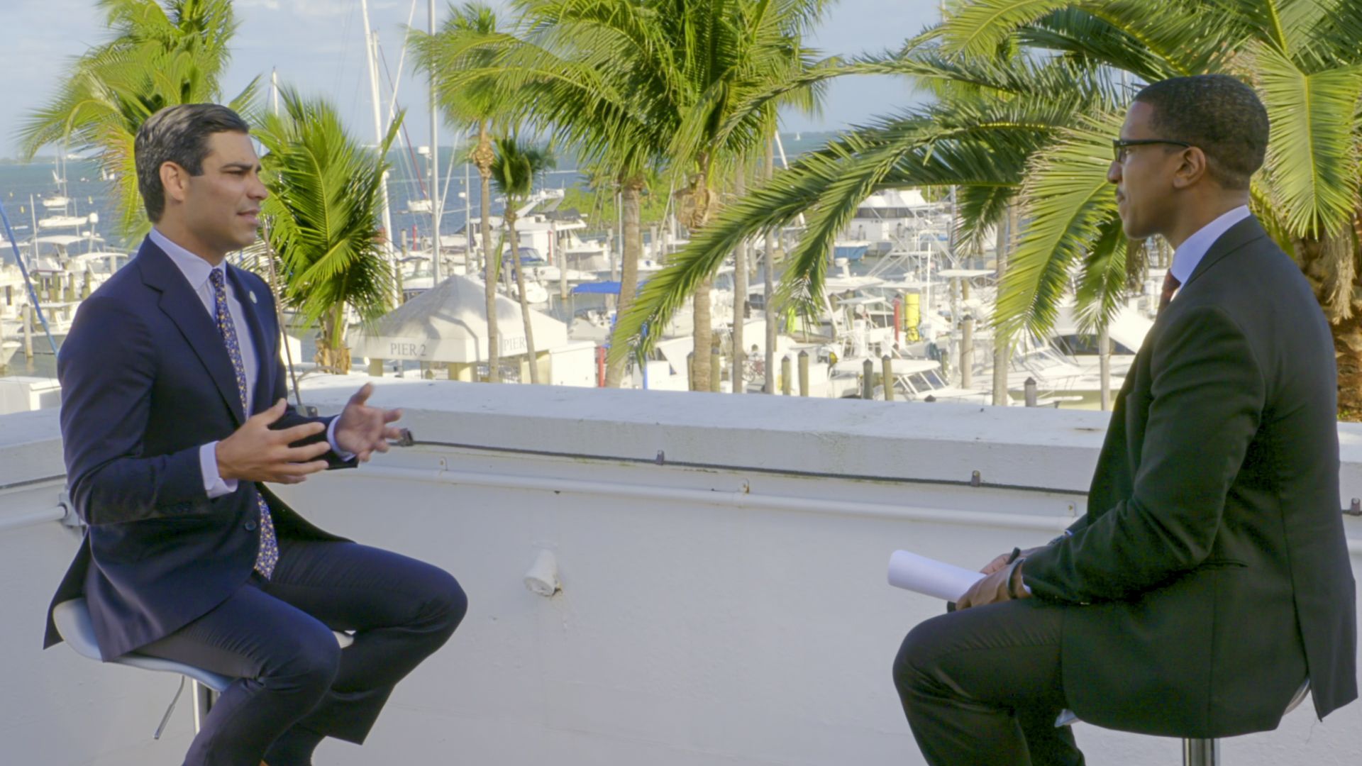 A photo of Miami Mayor Francis Suarez being interviewed for Axios on HBO.