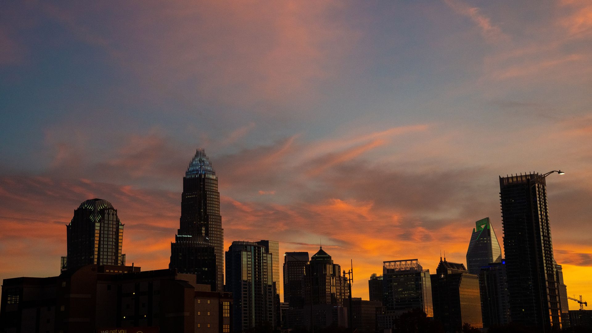 The Charlotte skyline at sunset
