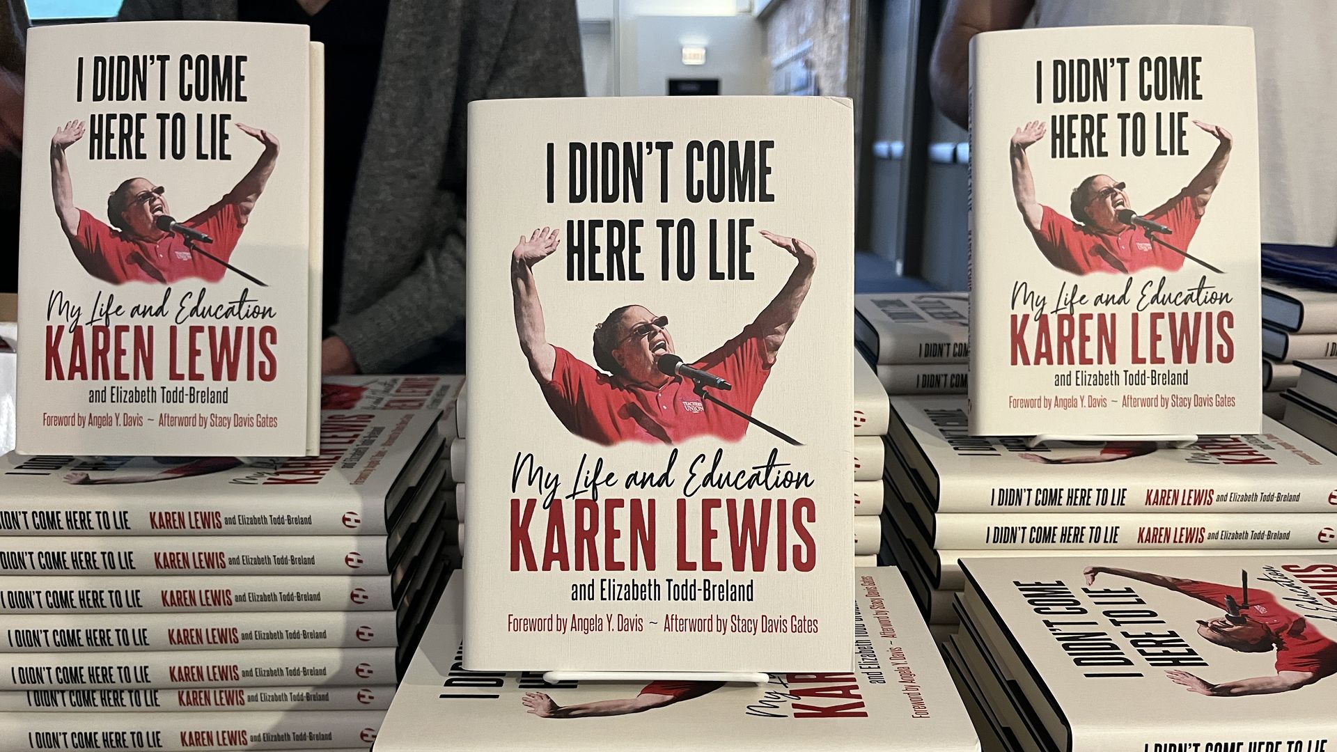 book cover with a woman raising her hands 