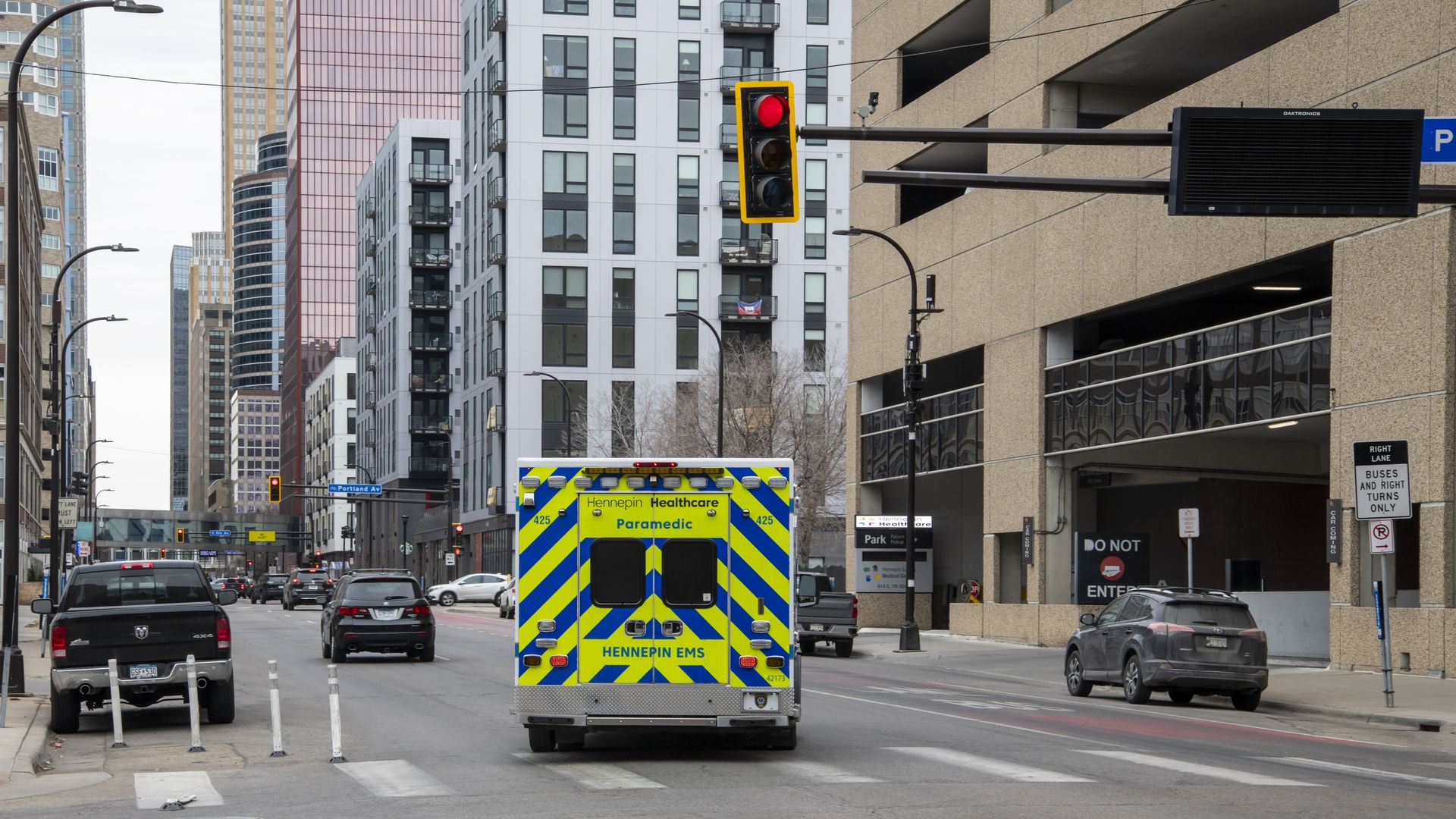 Hennepin Healthcare ambulance going to an emergency in downtown Minneapolis. (