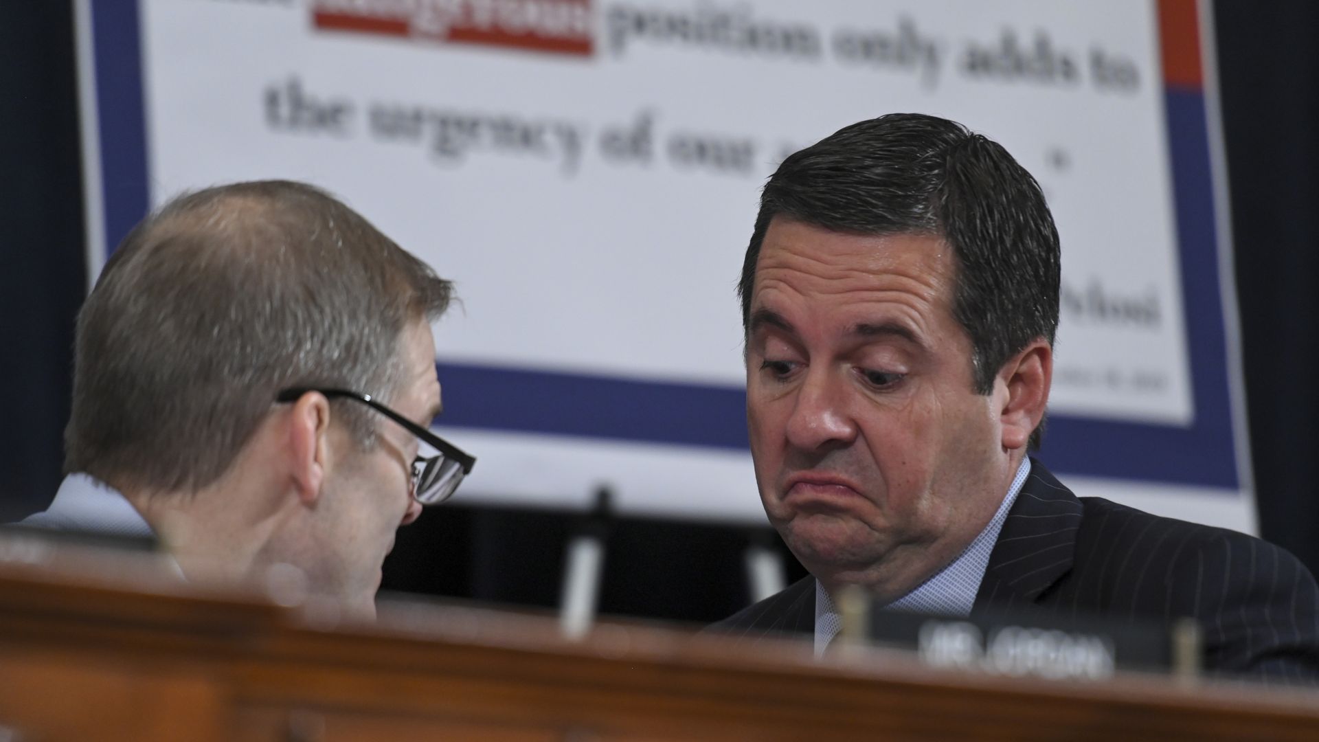 Republican representatives Jim Jordan, L, and Devin Nunes, R, confer g on Wednesday, November 20, 2019, in Washington, DC.