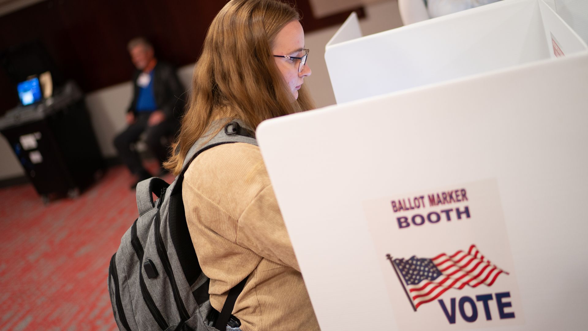 A voter casts a ballot.