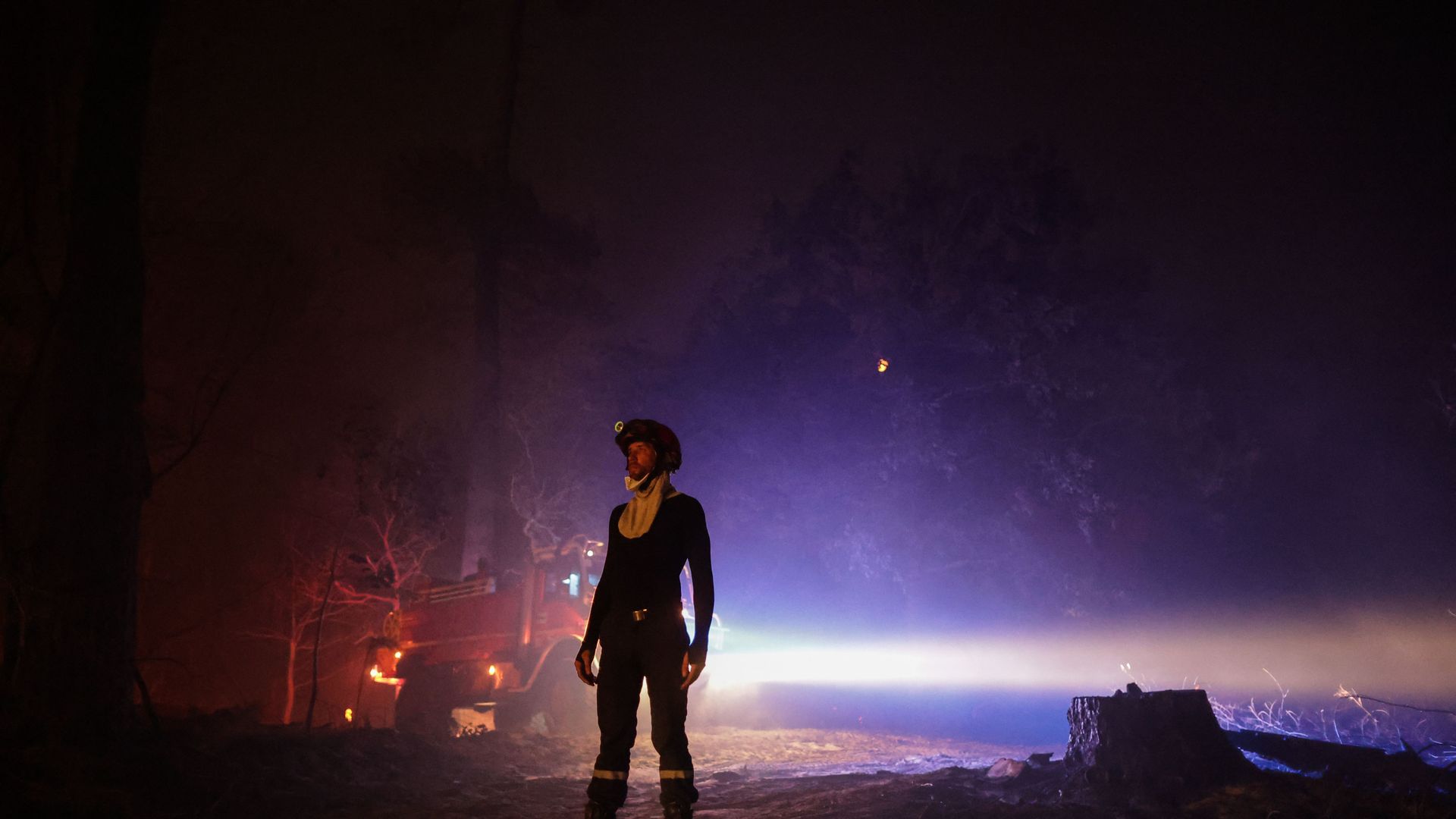 Photo of a French firefighter at night