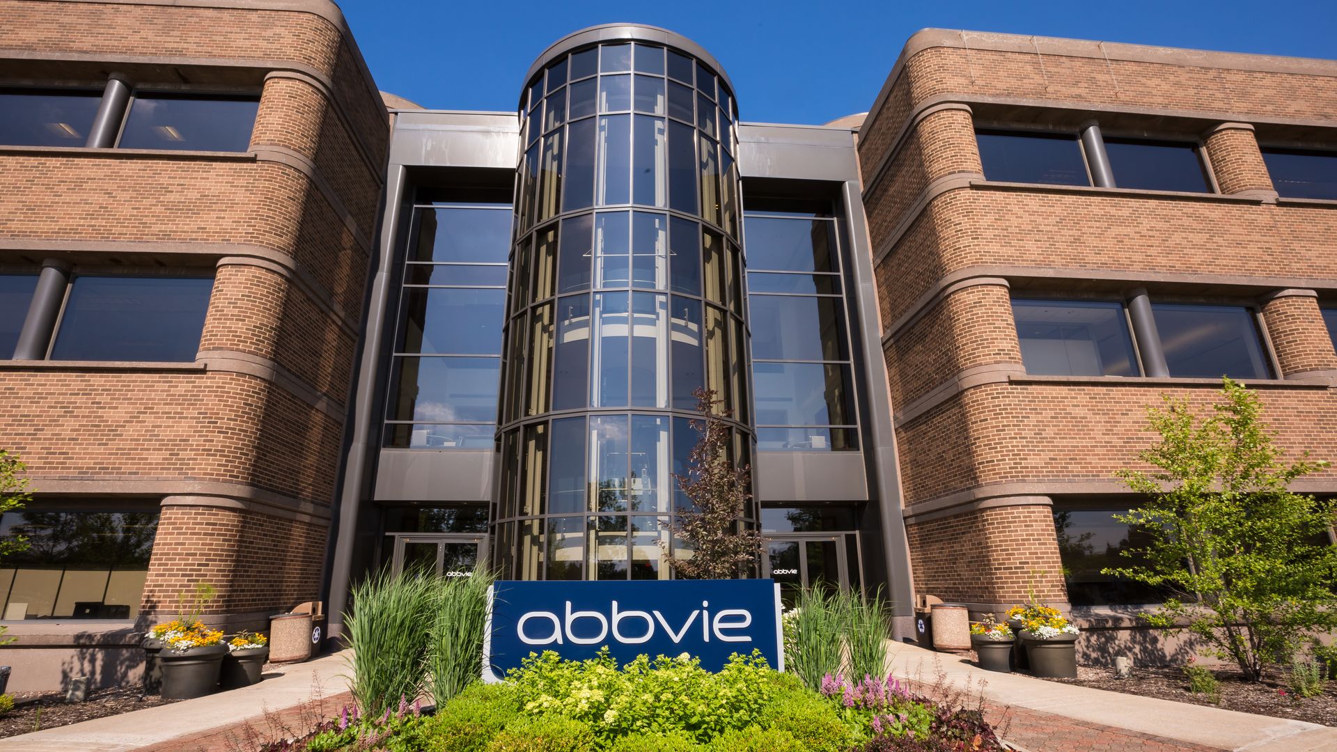 AbbVie headquarters building with an AbbVie sign in front.