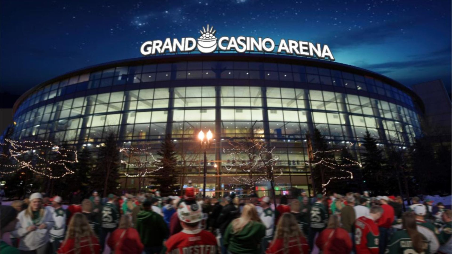 A photo rendering of the exterior of a hockey arena at night with the signage "Grand Casino Arena"