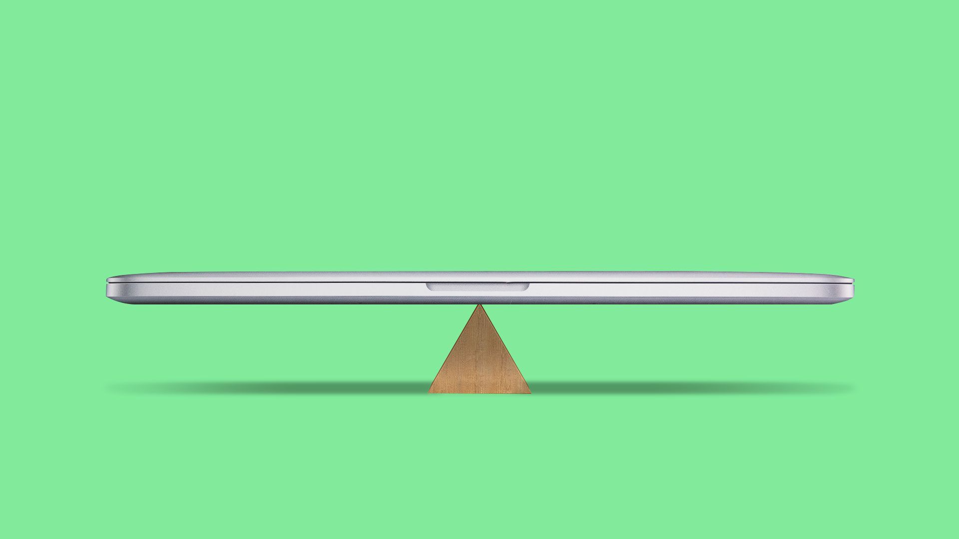 Illustration of a MacBook perfectly balanced on a fulcrum. 