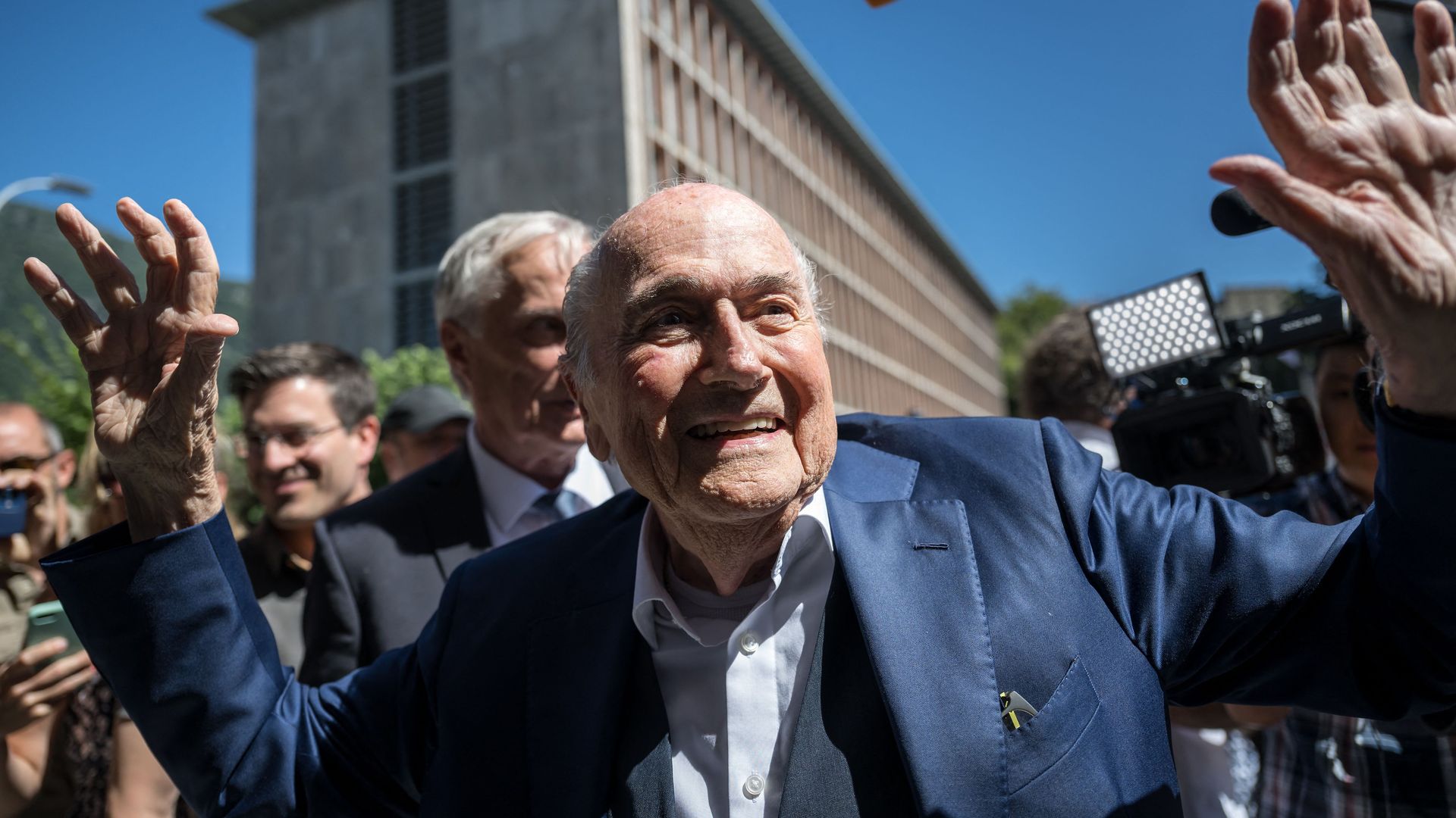 Former FIFA president Sepp Blatter reacts to leaving Switzerland's Federal Criminal Court.