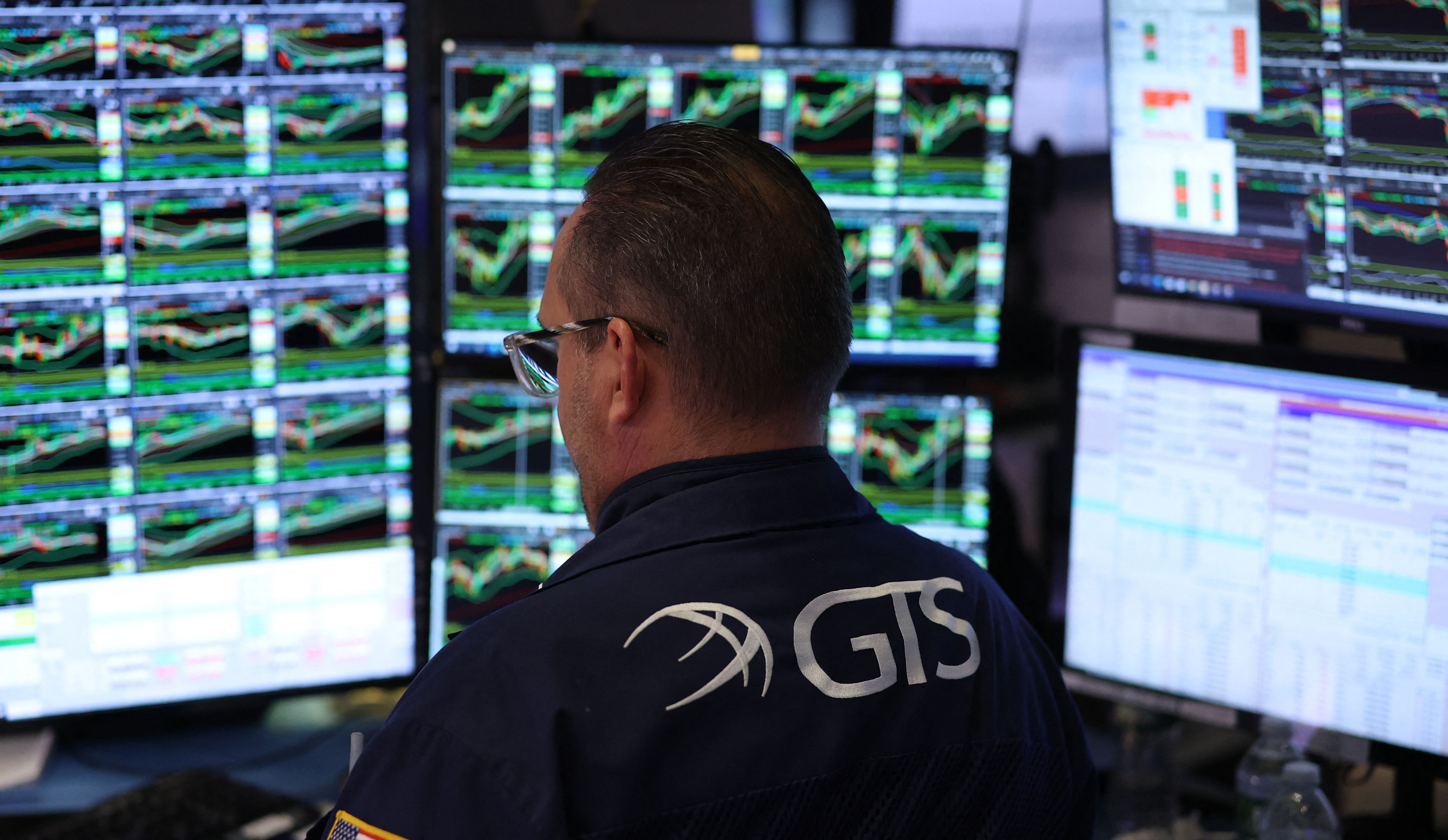 A trader works on the floor of the New York Stock Exchange (NYSE) at the closing bell in New York City, on April 11, 2025. (Photo by TIMOTHY A. CLARY / AFP) (Photo by TIMOTHY A. CLARY/AFP via Getty Images)