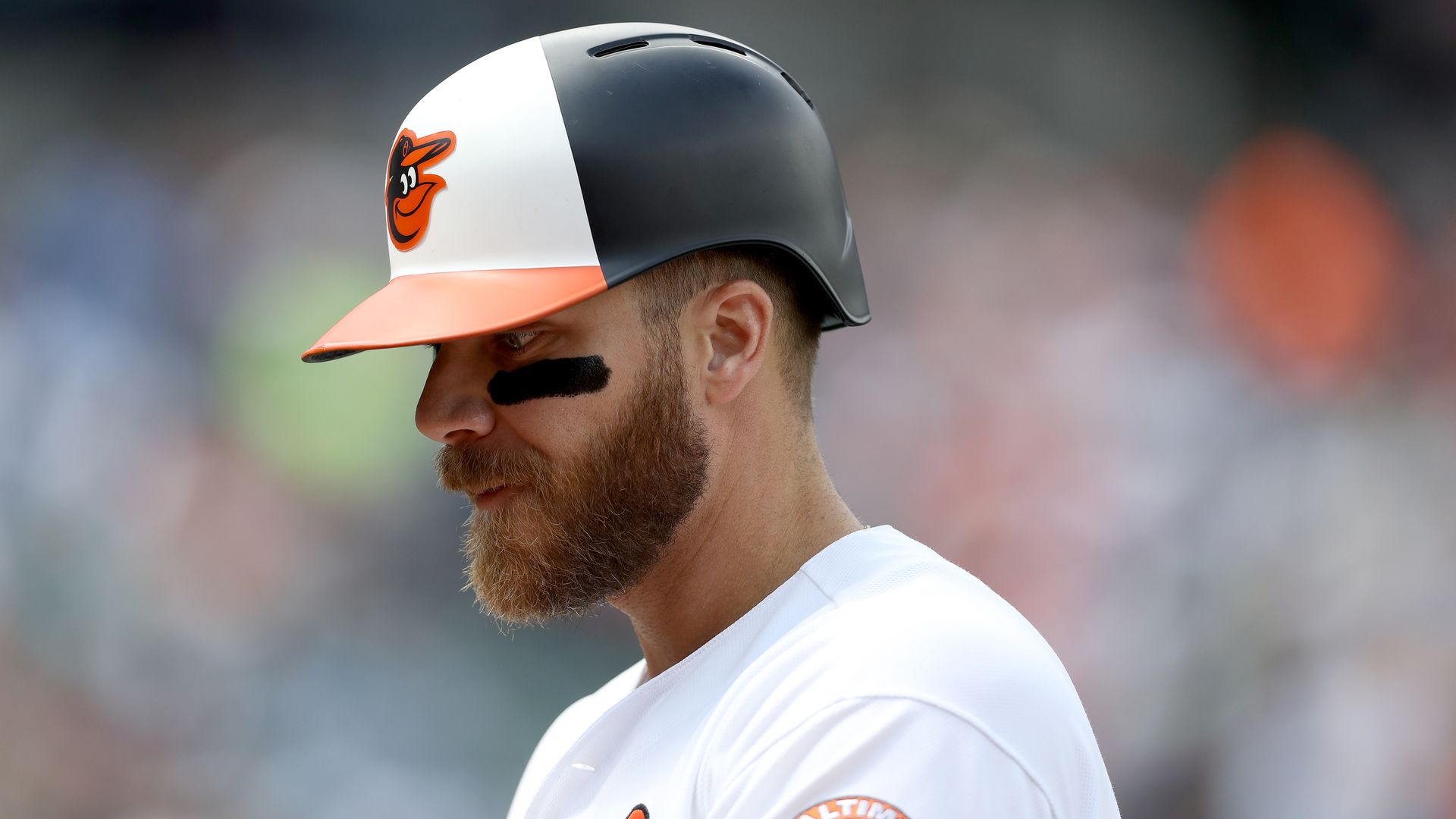 Chris Davis looks on after flying out